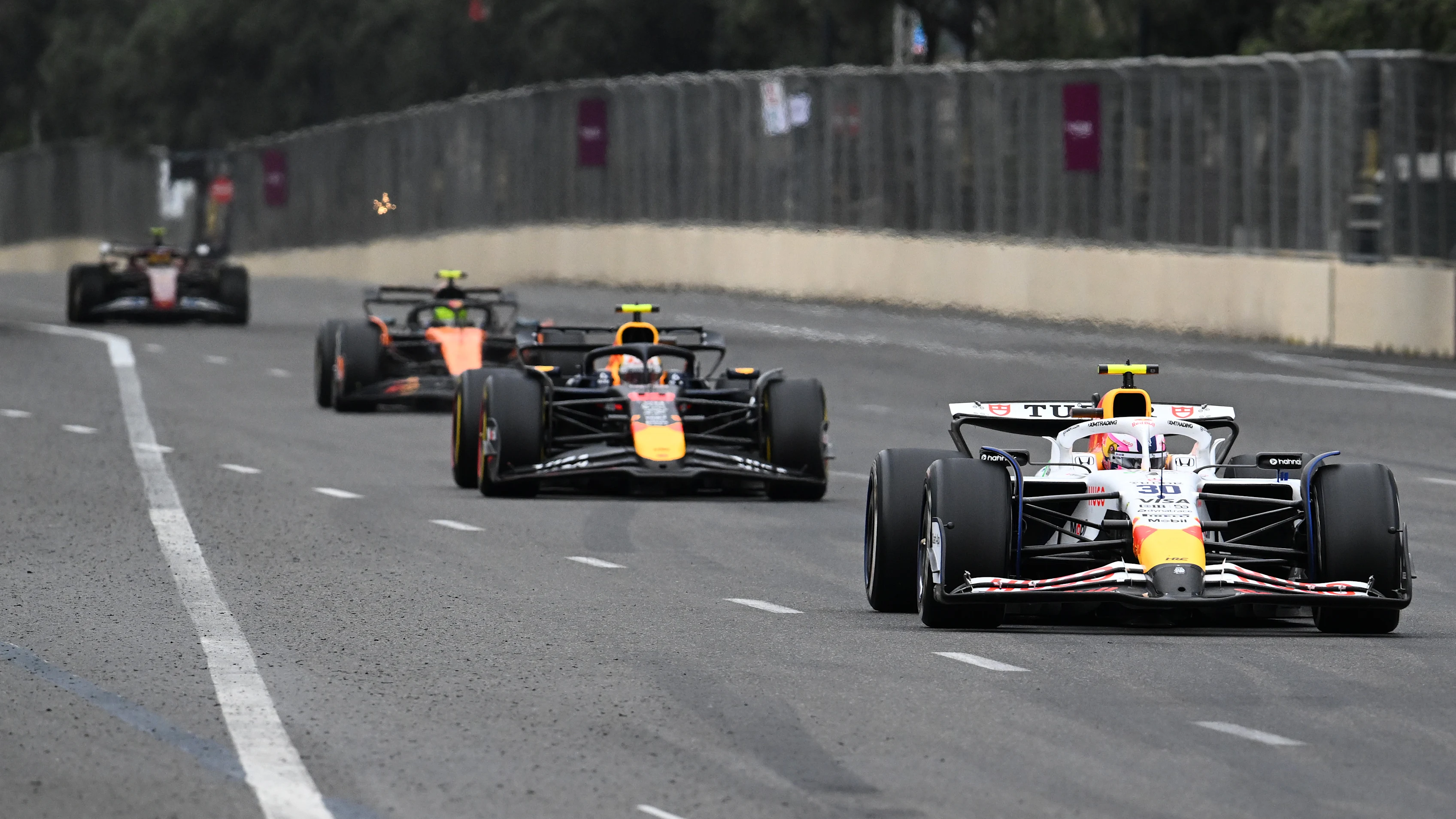 BAKU, AZERBAIJAN - SEPTEMBER 21: Liam Lawson of New Zealand driving the (30) Visa Cash App Racing