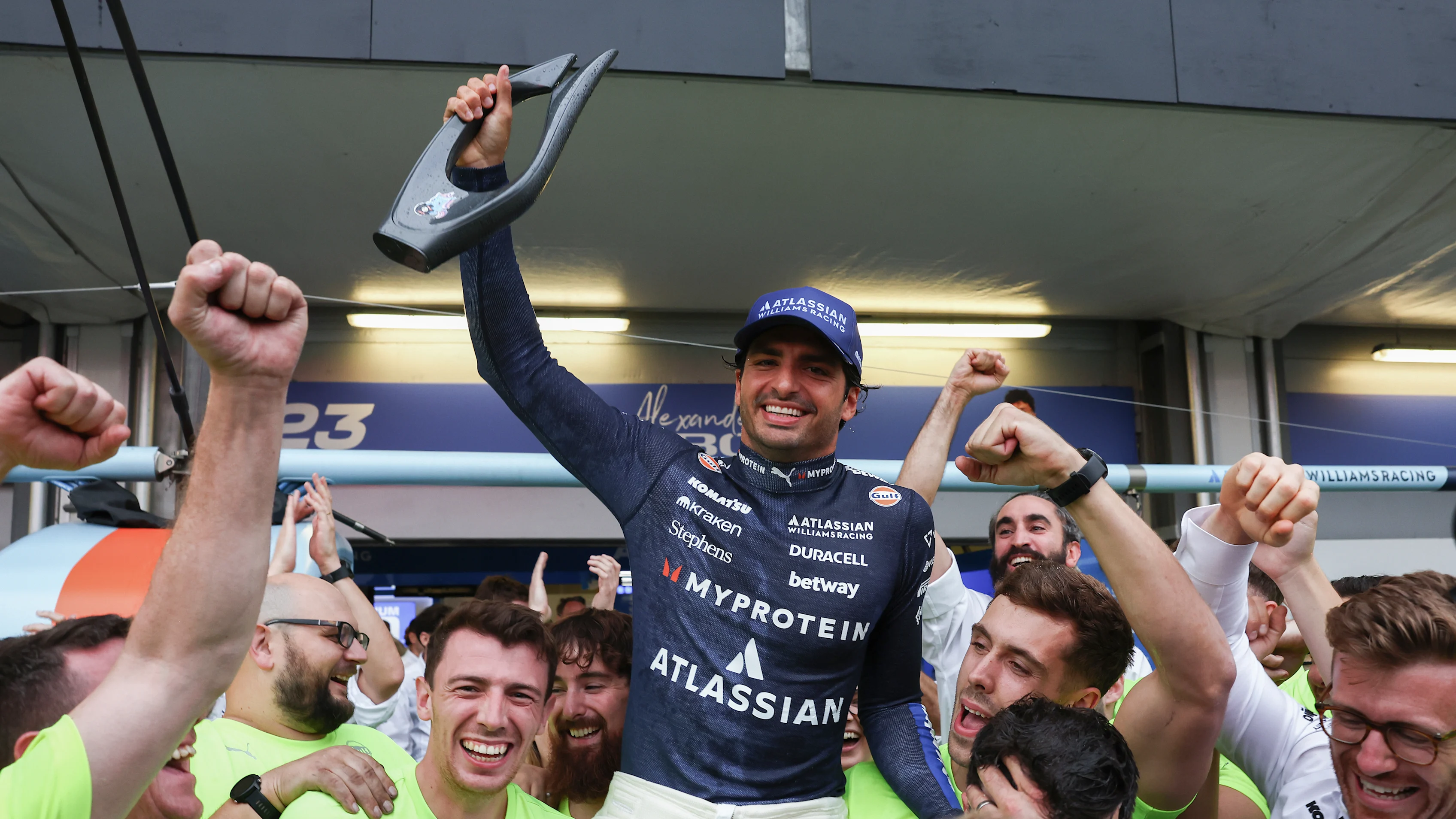 BAKU, AZERBAIJAN - SEPTEMBER 21: Carlos Sainz of Spain and Williams celebrates finishing in third