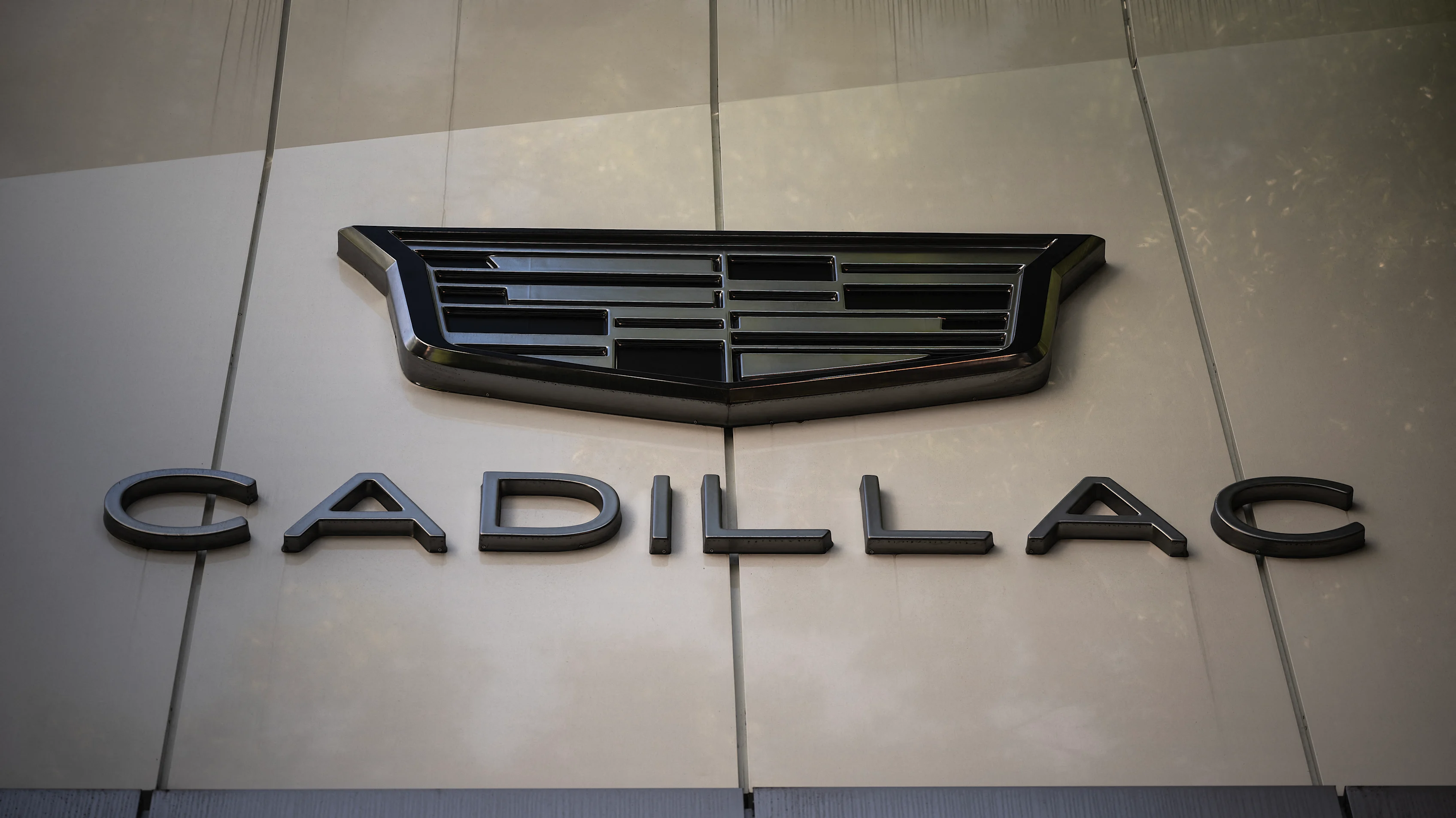 View of the Cadillac logo at a Cadillac car showroom in Mexico City on December 5, 2024. Sales of