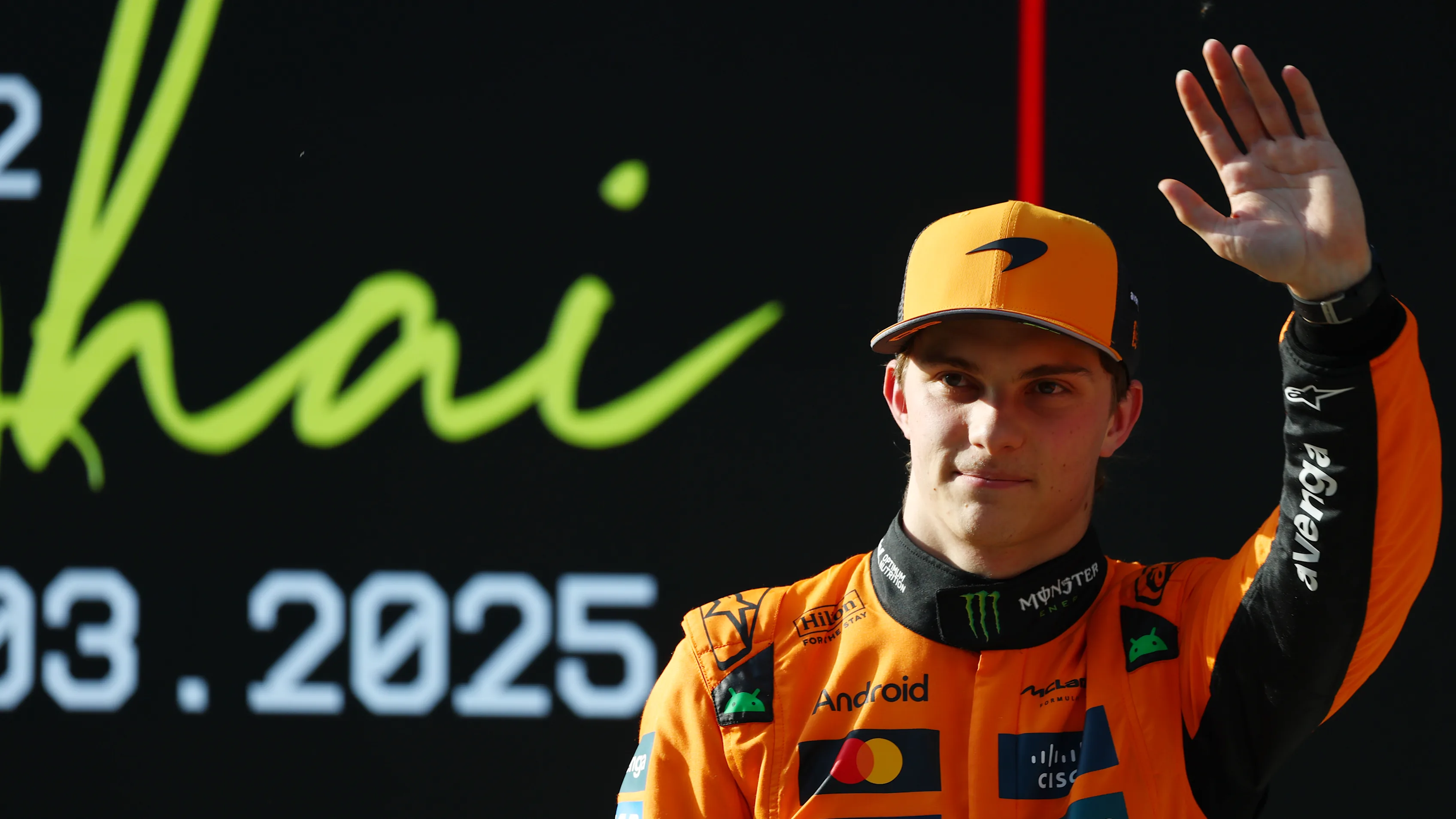 TOPSHOT - McLaren's Australian driver Oscar Piastri gives a thumbs as he celebrates taking pole
