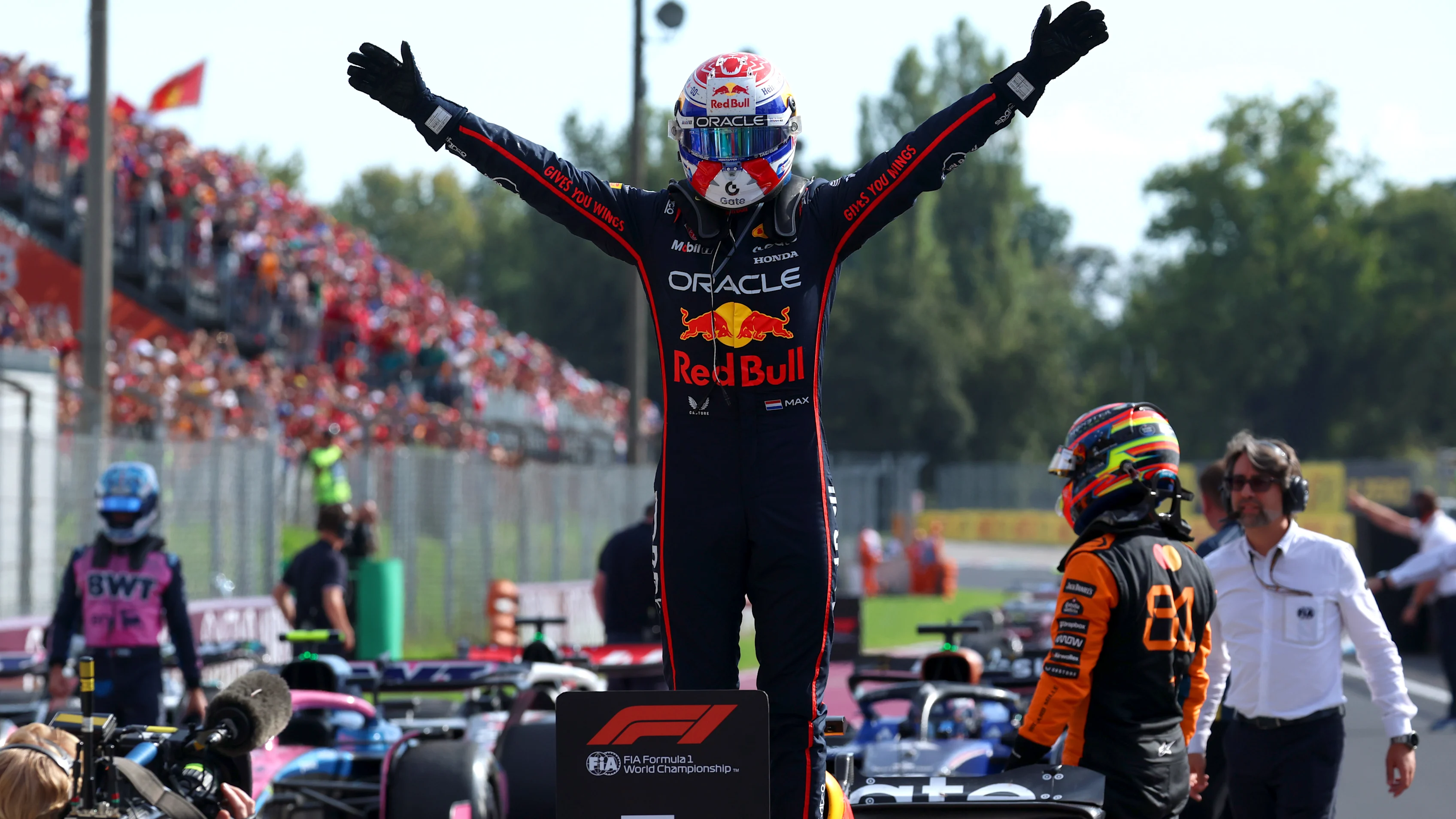 MONZA, ITALY - SEPTEMBER 07: Race winner Max Verstappen of the Netherlands and Oracle Red Bull