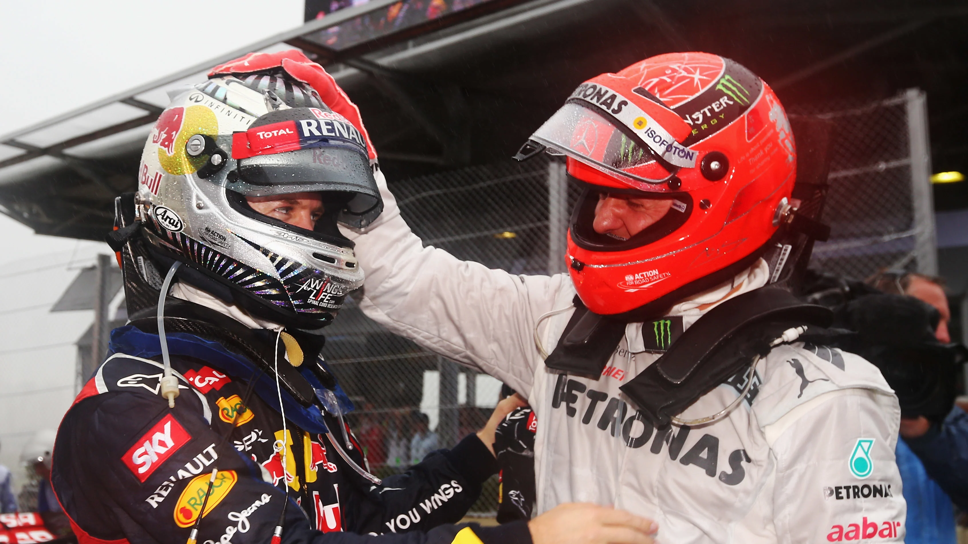 SAO PAULO, BRAZIL - NOVEMBER 25:  Sebastian Vettel of Germany and Red Bull Racing is congratulated