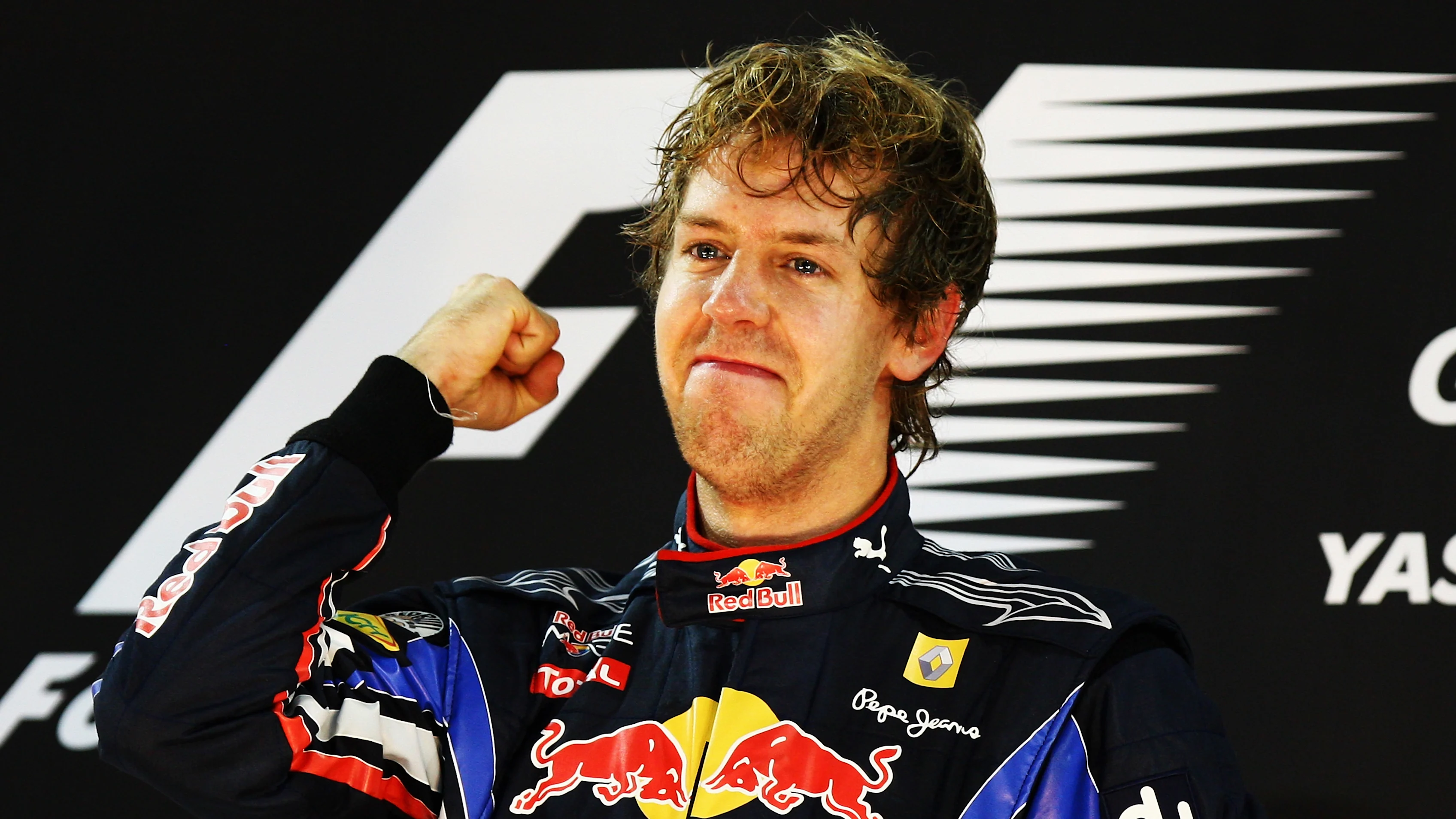 ABU DHABI, UNITED ARAB EMIRATES - NOVEMBER 14:  Race winner and F1 2010 World Champion Sebastian