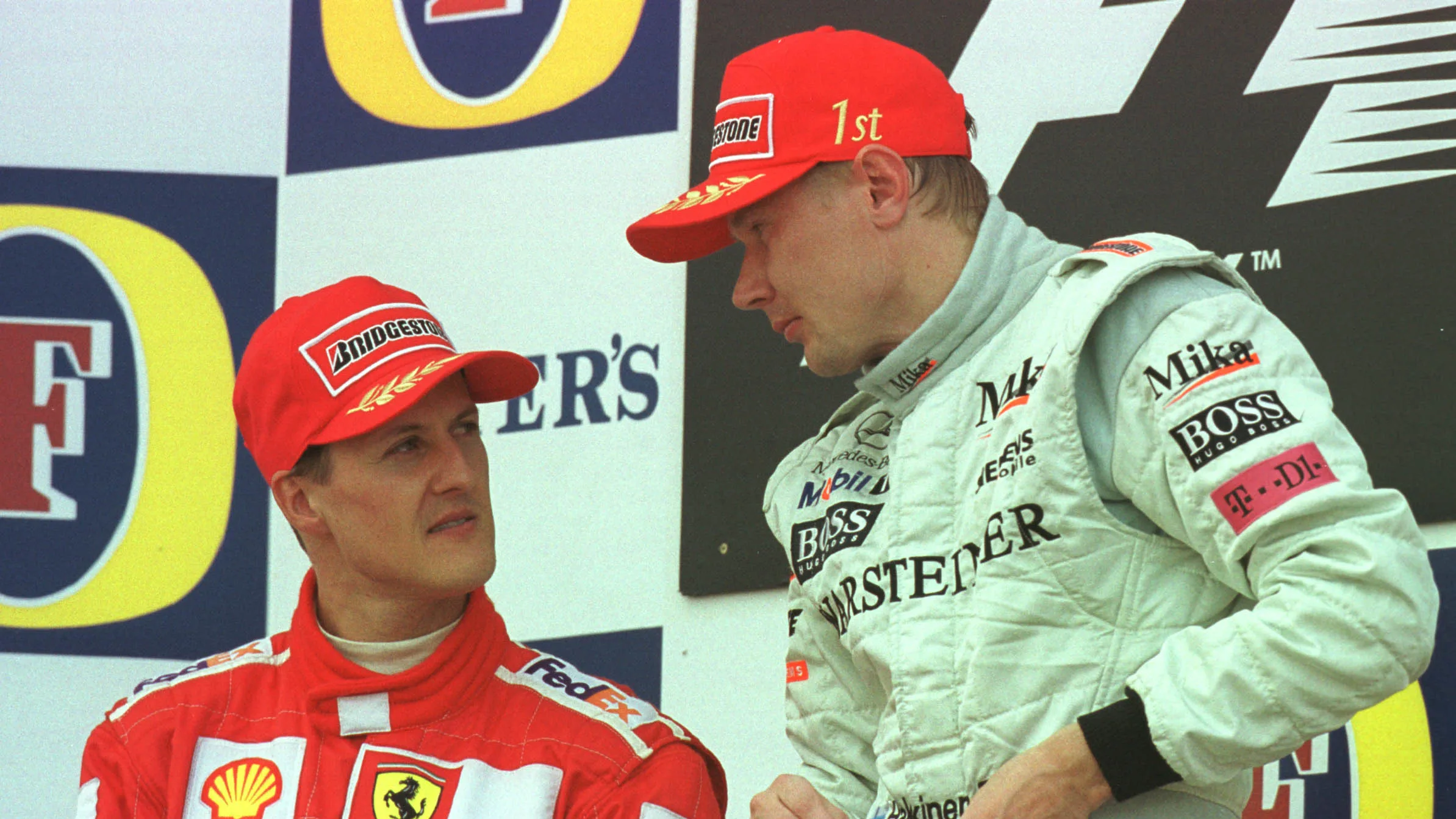 15 Jul 2001:  2nd placed Michael Schuamcher of Ferrari and Germany chats to race winner Mika