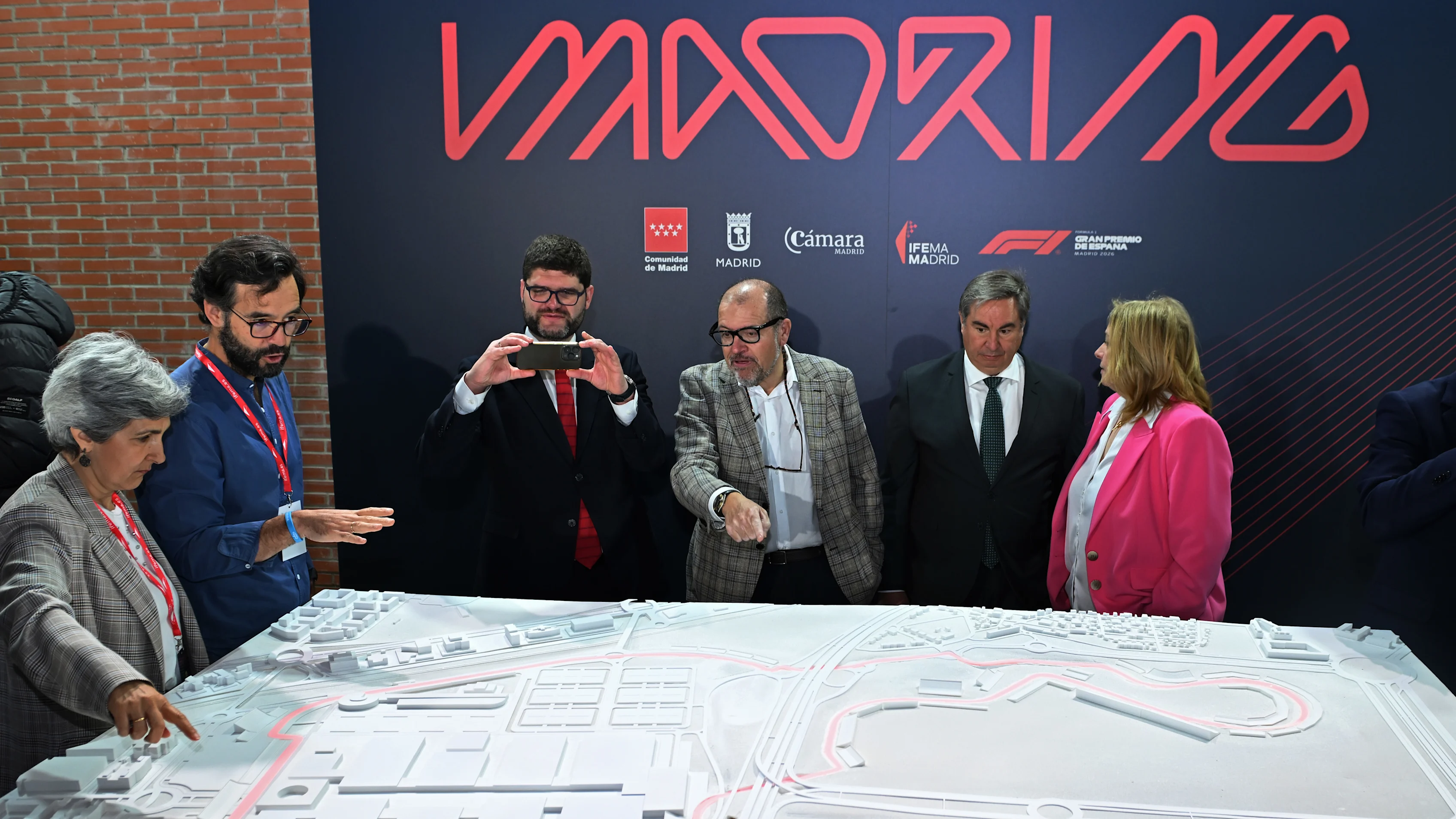 MADRID, SPAIN - APRIL 25: Officials look at a model of the Formula 1 track during the F1 Madrid