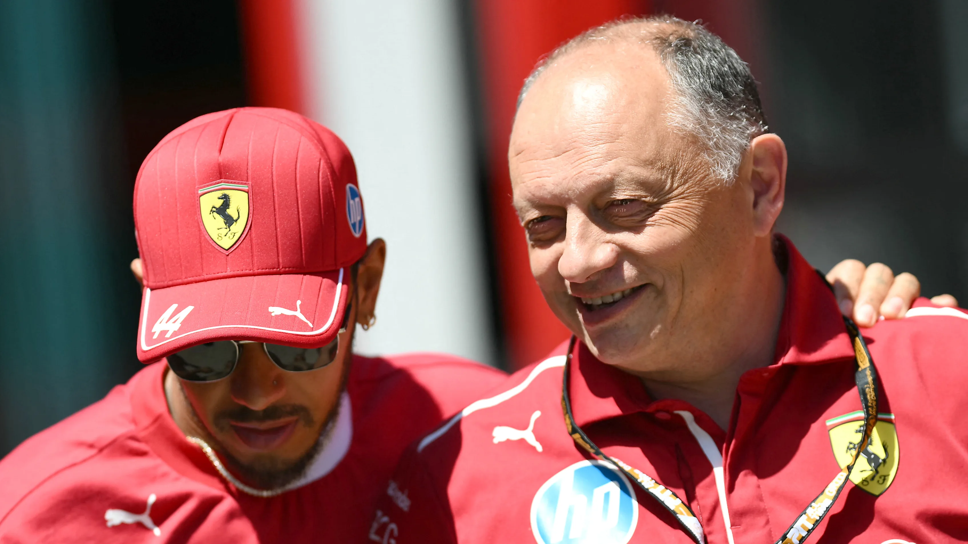 Ferrari's British driver Lewis Hamilton (L) and Ferrari's French team principal Frederic Vasseur
