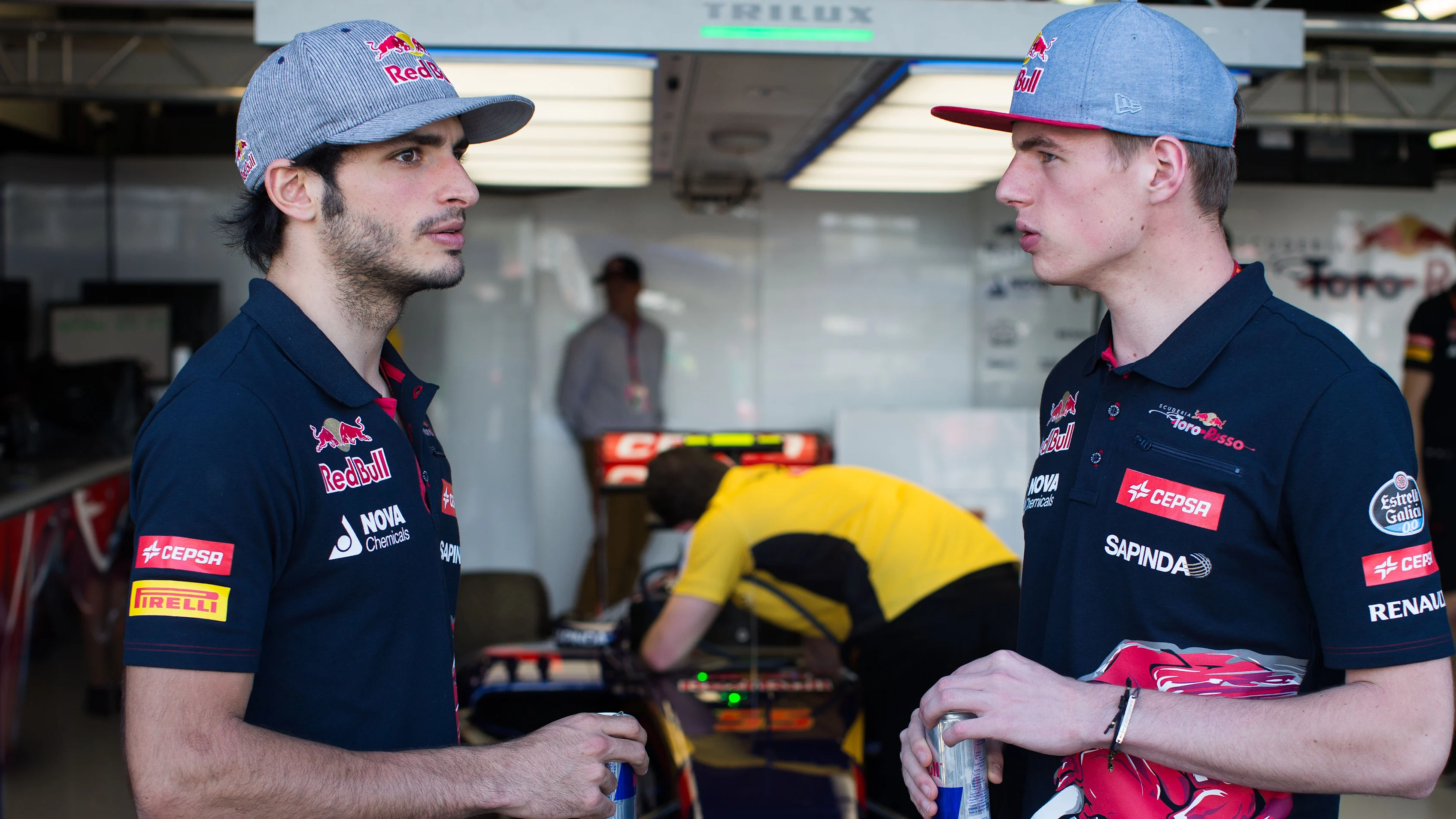 MELBOURNE, AUSTRALIA - MARCH 14:  Carlos Sainz of Spain and Max Verstappen of The Netherlands both