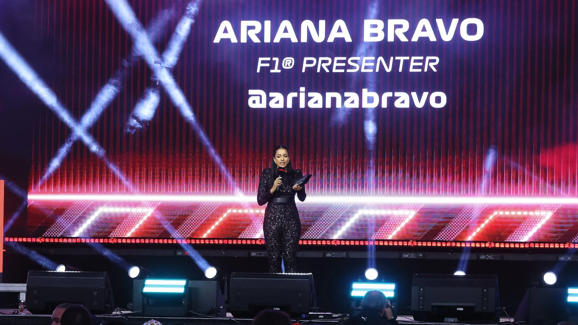 LAS VEGAS, NEVADA - NOVEMBER 22: Ariana Bravo speaks onstage in the East Harmon Zone ahead of the