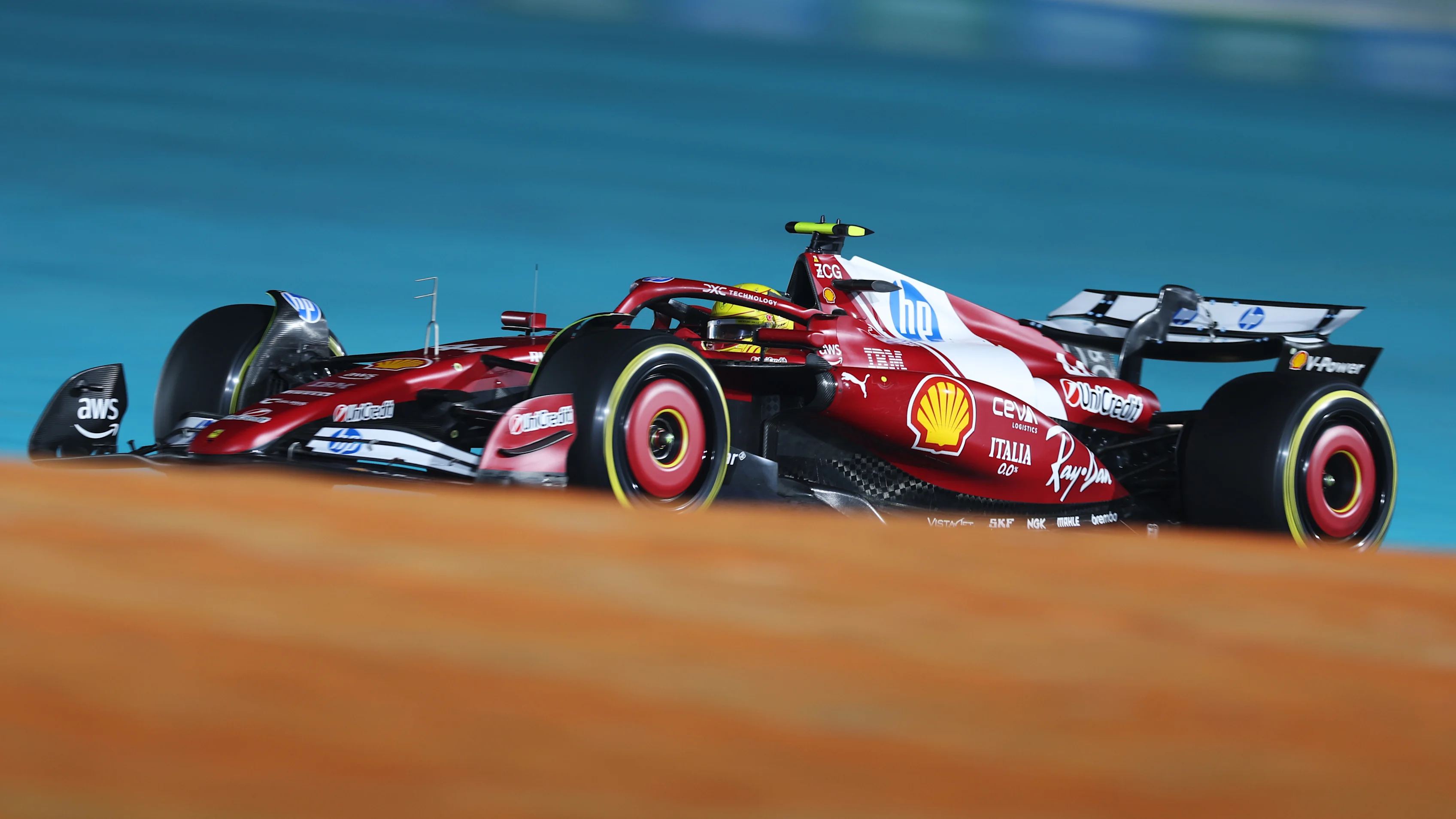 LUSAIL CITY, QATAR - NOVEMBER 28: Lewis Hamilton of Great Britain driving the (44) Scuderia Ferrari