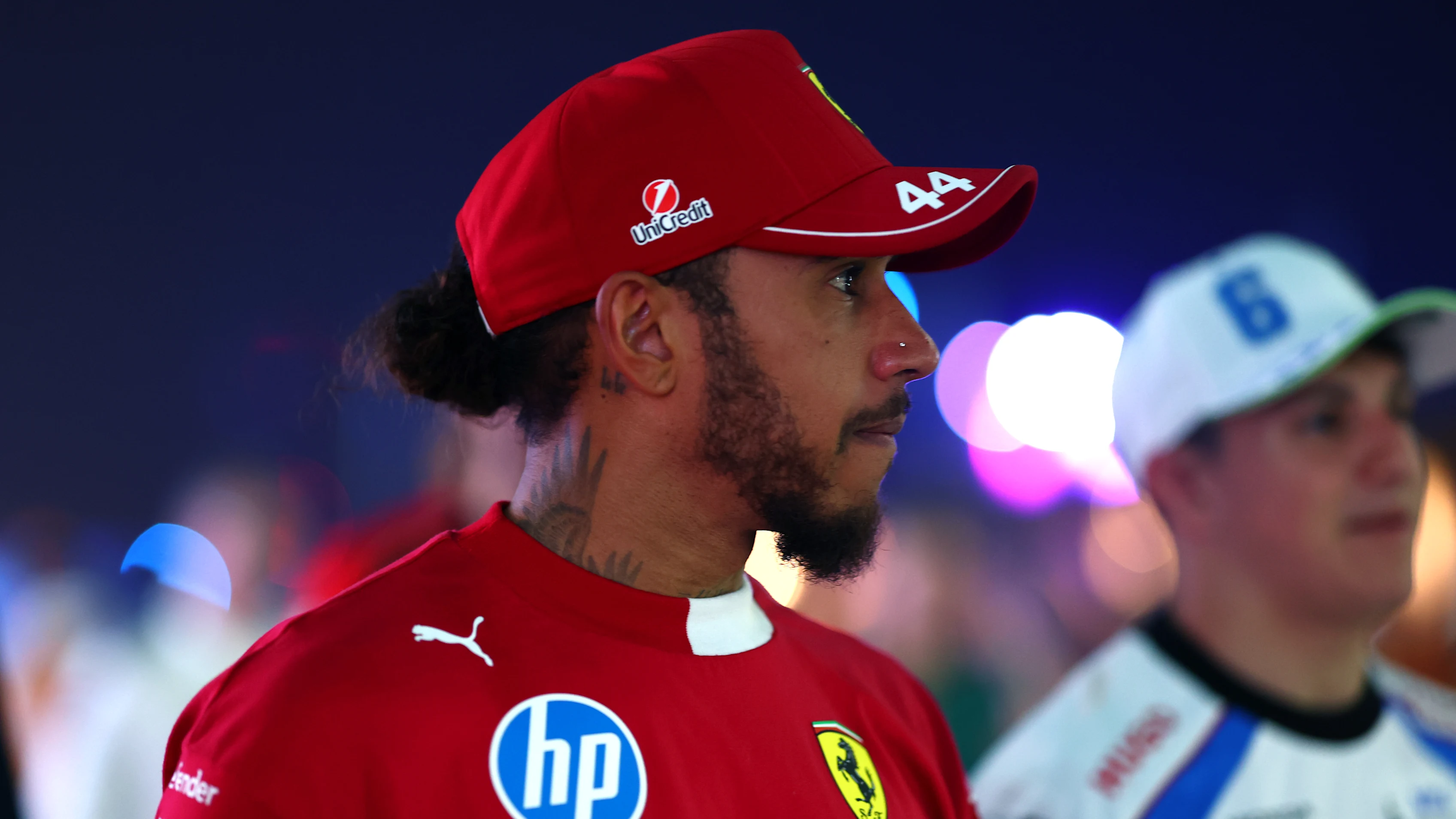 JEDDAH, SAUDI ARABIA - APRIL 18: Lewis Hamilton of Great Britain and Scuderia Ferrari looks on