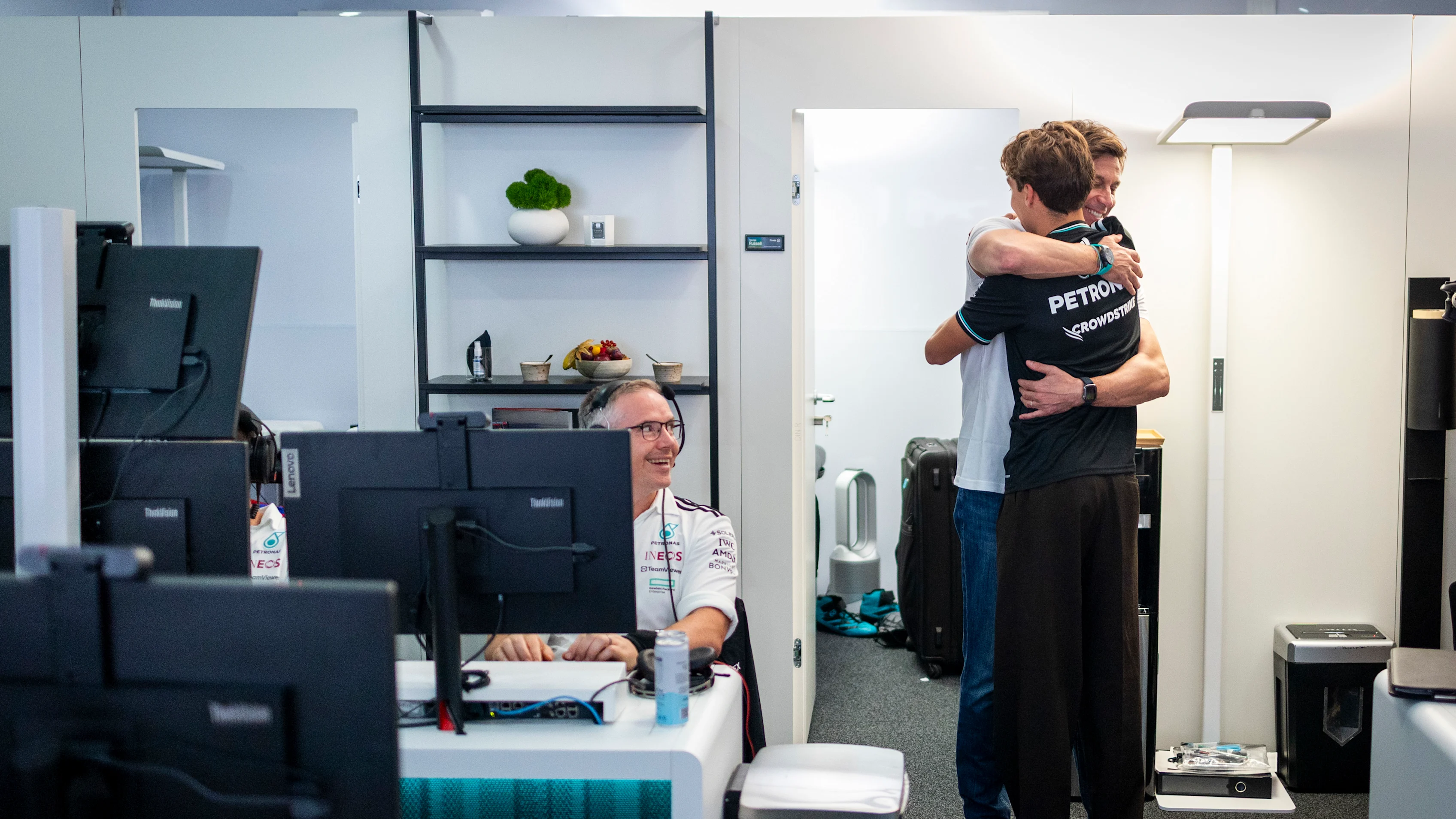 SINGAPORE, SINGAPORE - OCTOBER 05: Race winner George Russell of Great Britain and Mercedes AMG