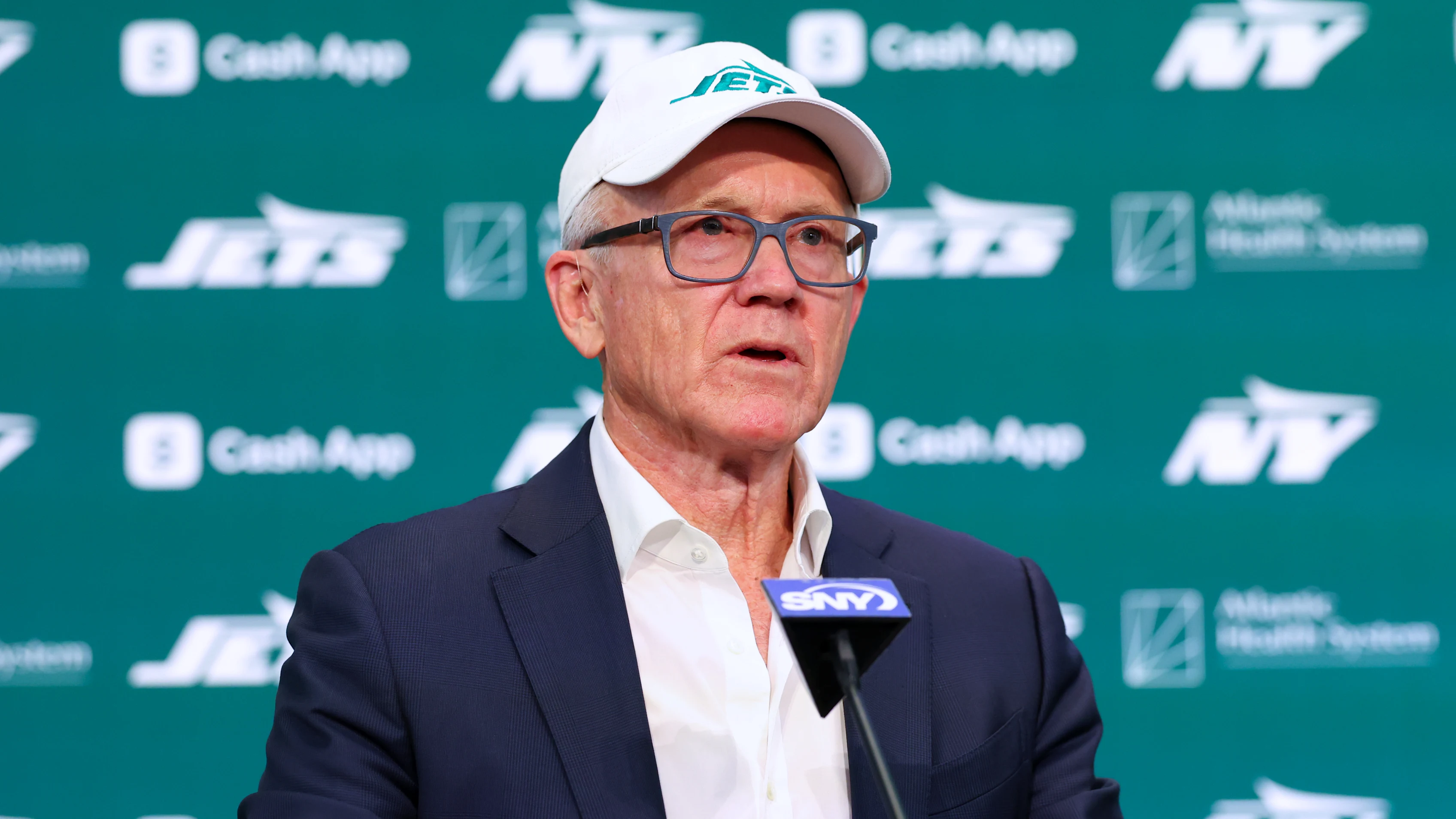 FLORHAM PARK, NEW JERSEY - JANUARY 27: New York Jets owner Woody Johnson speaks at the press
