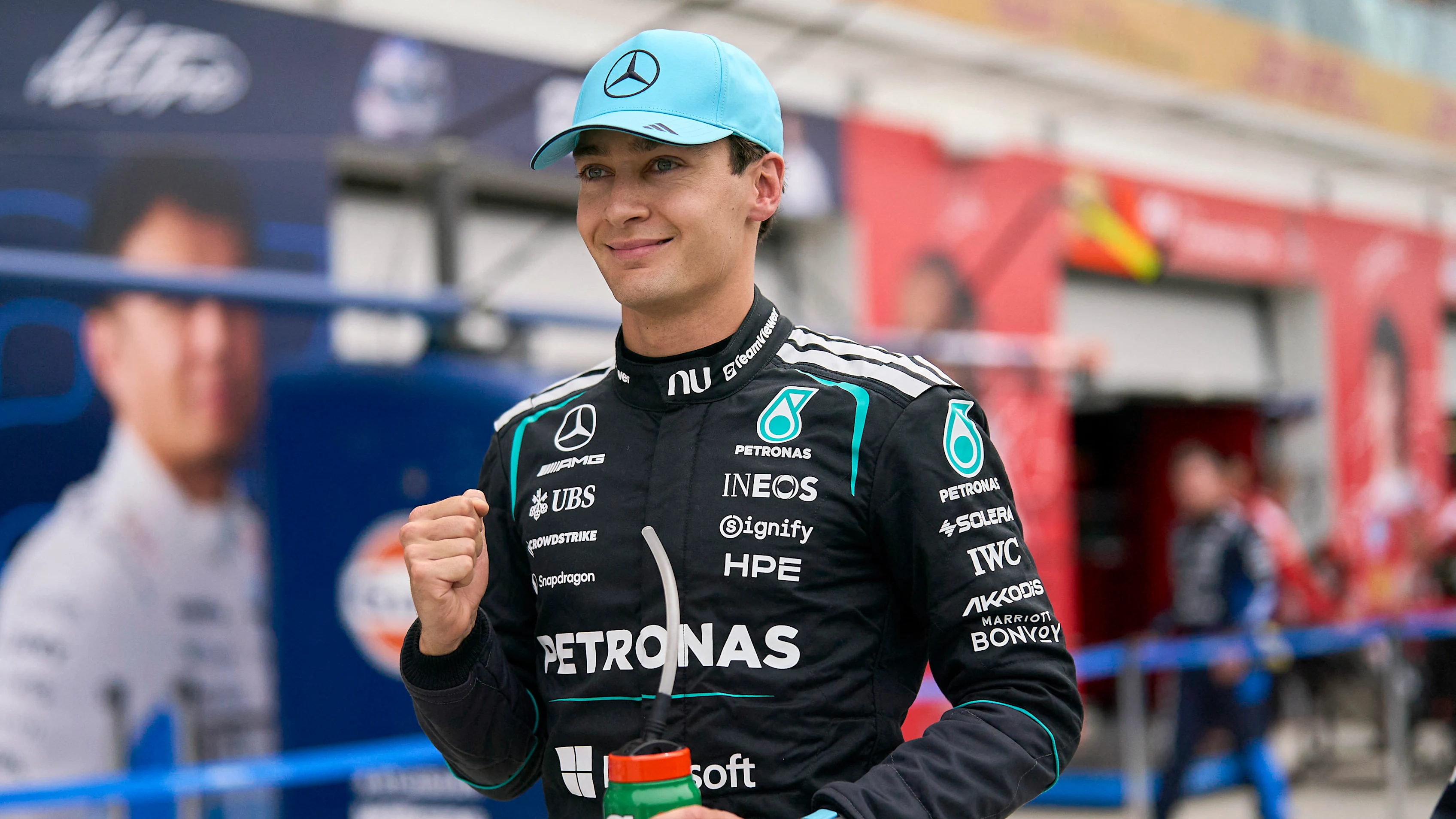 Mercedes' British driver George Russell celebrates after winning the Sprint race ahead of the 2026