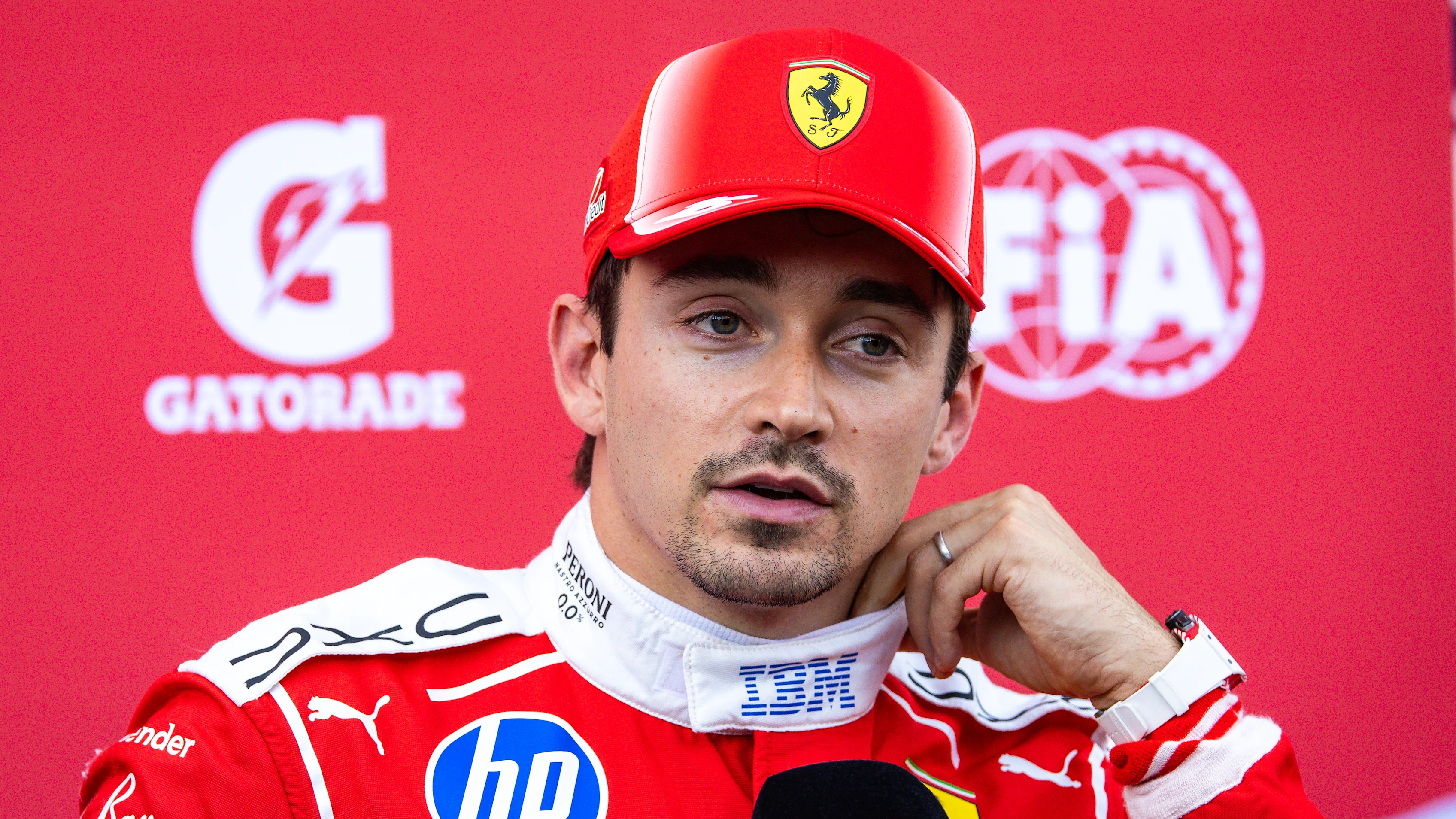 NORTHAMPTON, ENGLAND - JULY 3: Charles Leclerc of Monaco and Ferrari answers questions in the TV