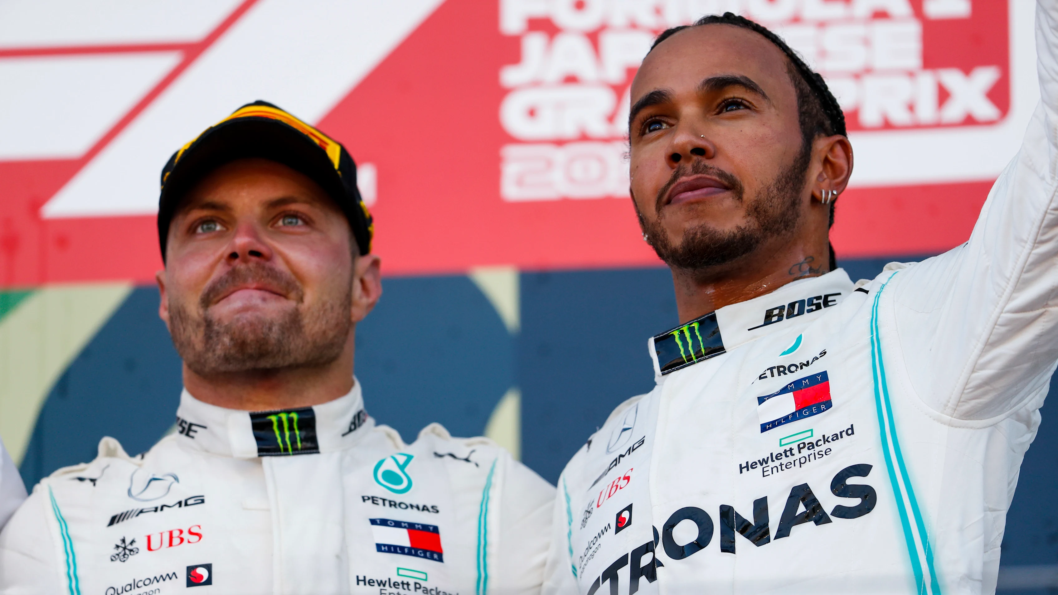 SUZUKA, JAPAN - OCTOBER 13: Lewis Hamilton, Mercedes AMG F1 and Race winner Valtteri Bottas,