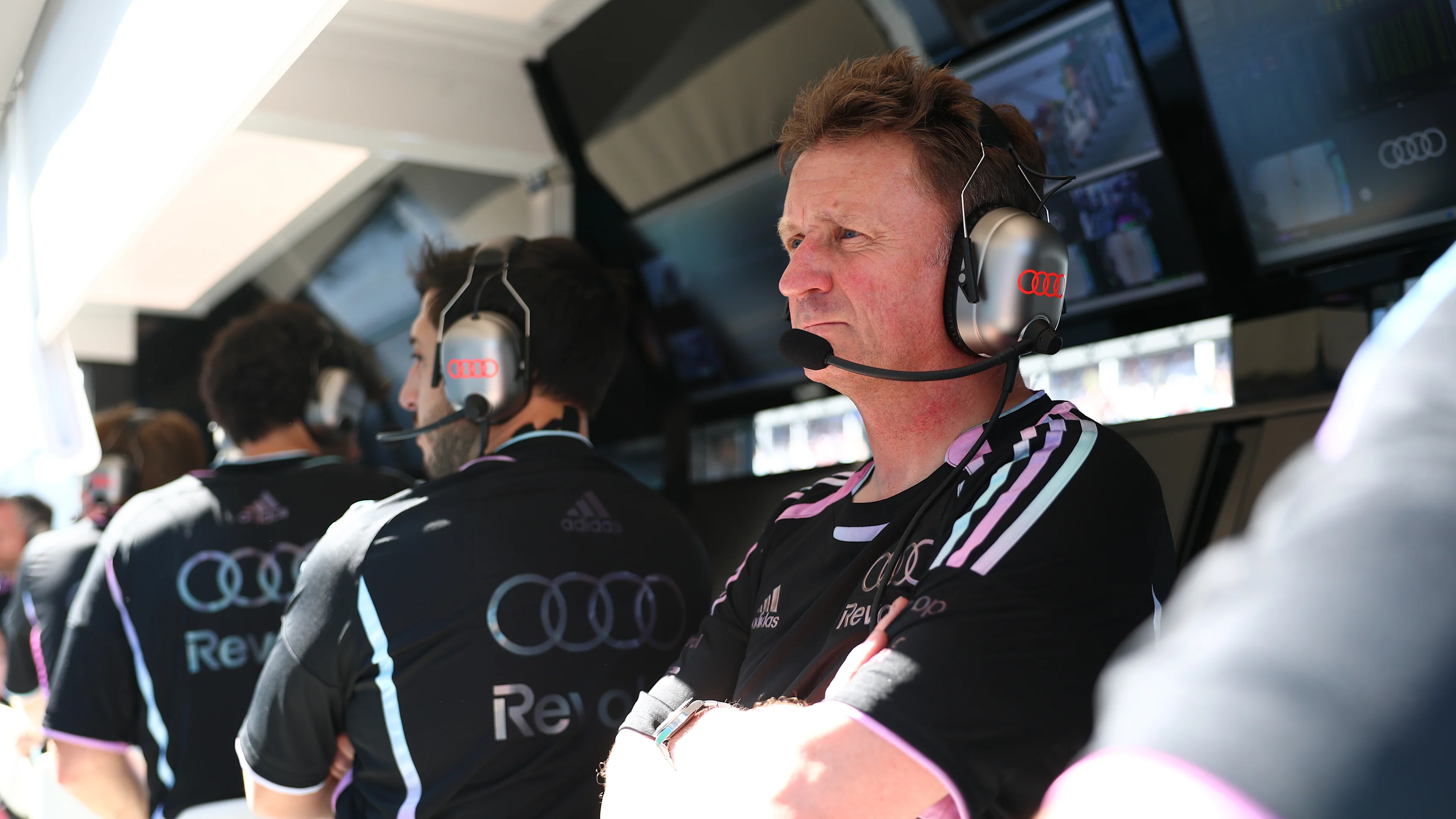 MIAMI, FLORIDA - MAY 01: Allan McNish, Racing Director of Audi F1 Team looks on from the pit wall