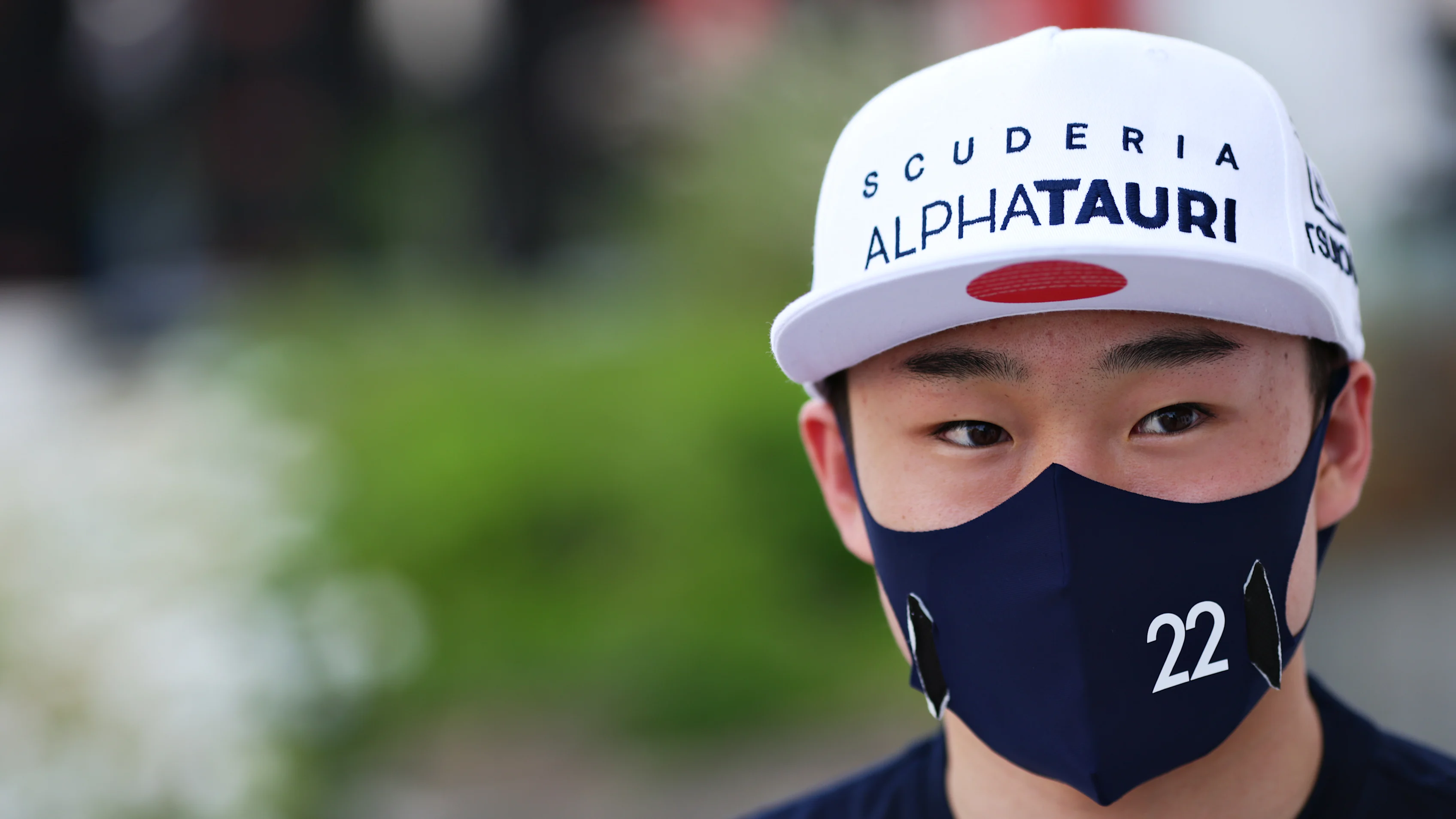 BAHRAIN, BAHRAIN - MARCH 25: Yuki Tsunoda of Japan and Scuderia AlphaTauri is interviewed in the