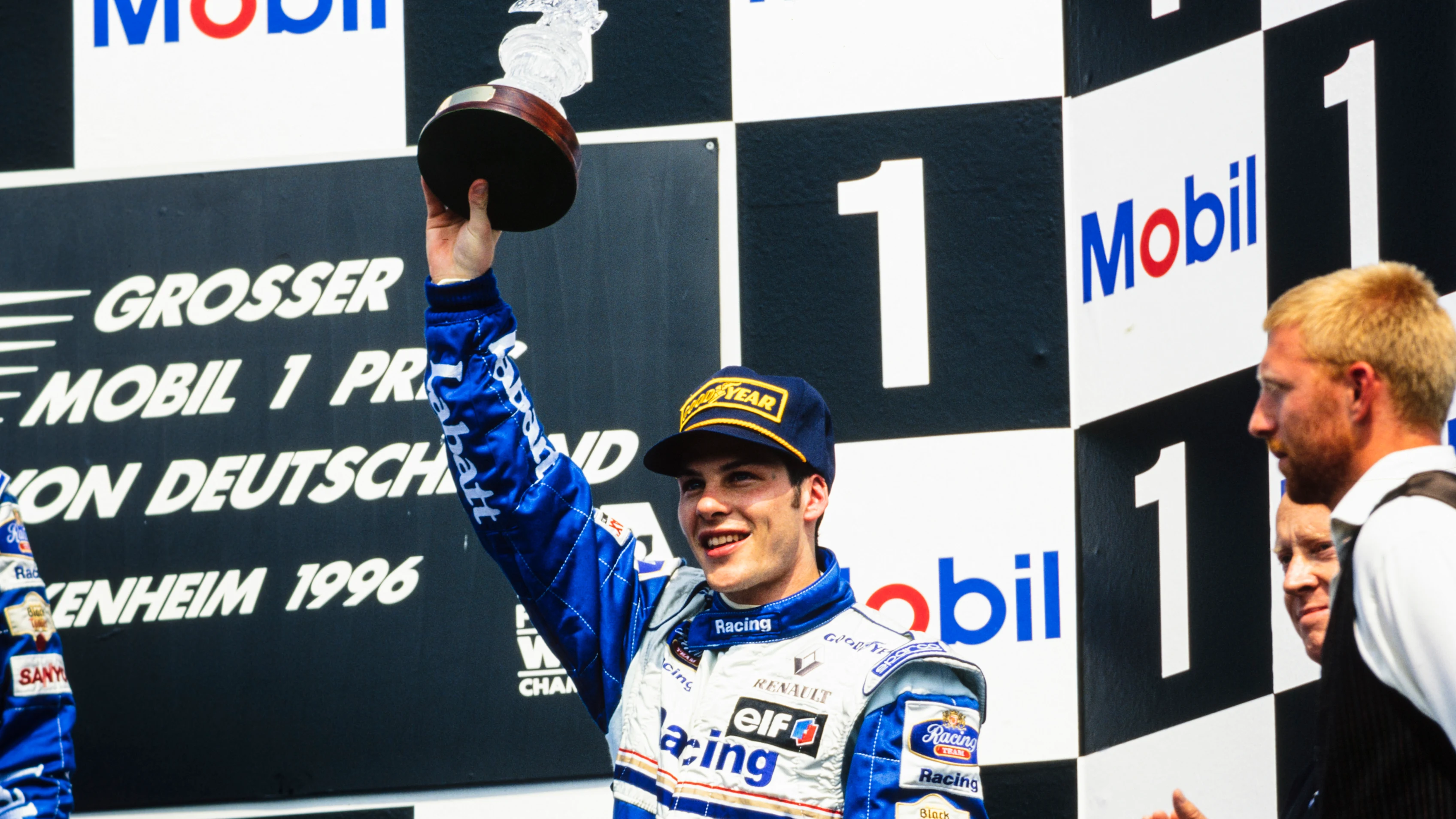 HOCKENHEIMRING, GERMANY - JULY 28: Jacques Villeneuve, 3rd position, celebrates on the podium