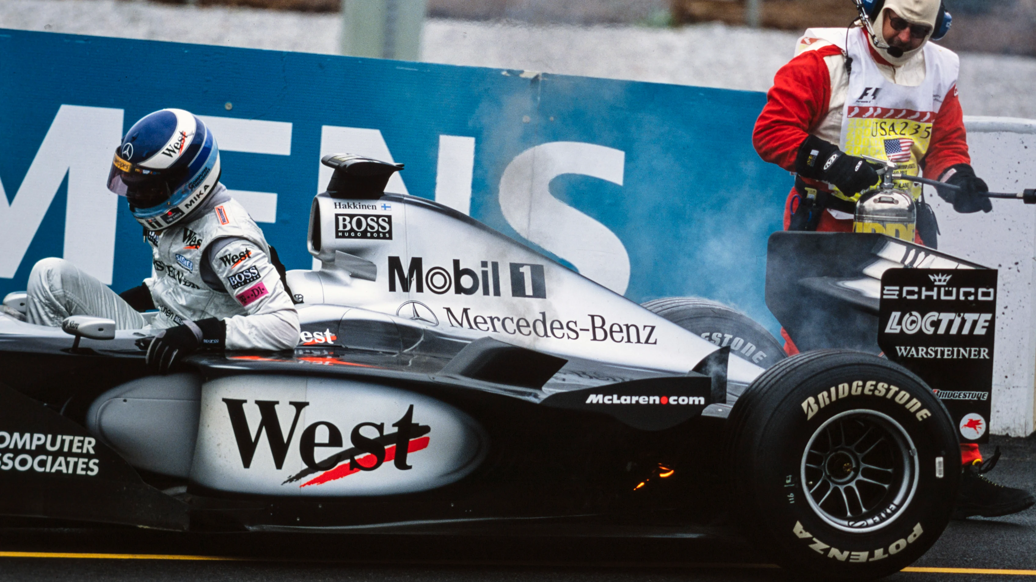 INDIANAPOLIS MOTOR SPEEDWAY, UNITED STATES OF AMERICA - SEPTEMBER 24: Mika Häkkinen gets out of his