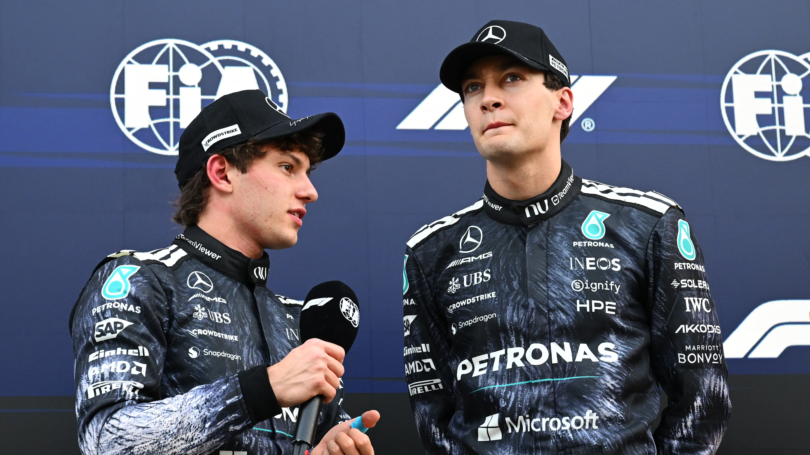 SUZUKA, JAPAN - MARCH 28: Pole position qualifier Andrea Kimi Antonelli of Italy and Mercedes AMG