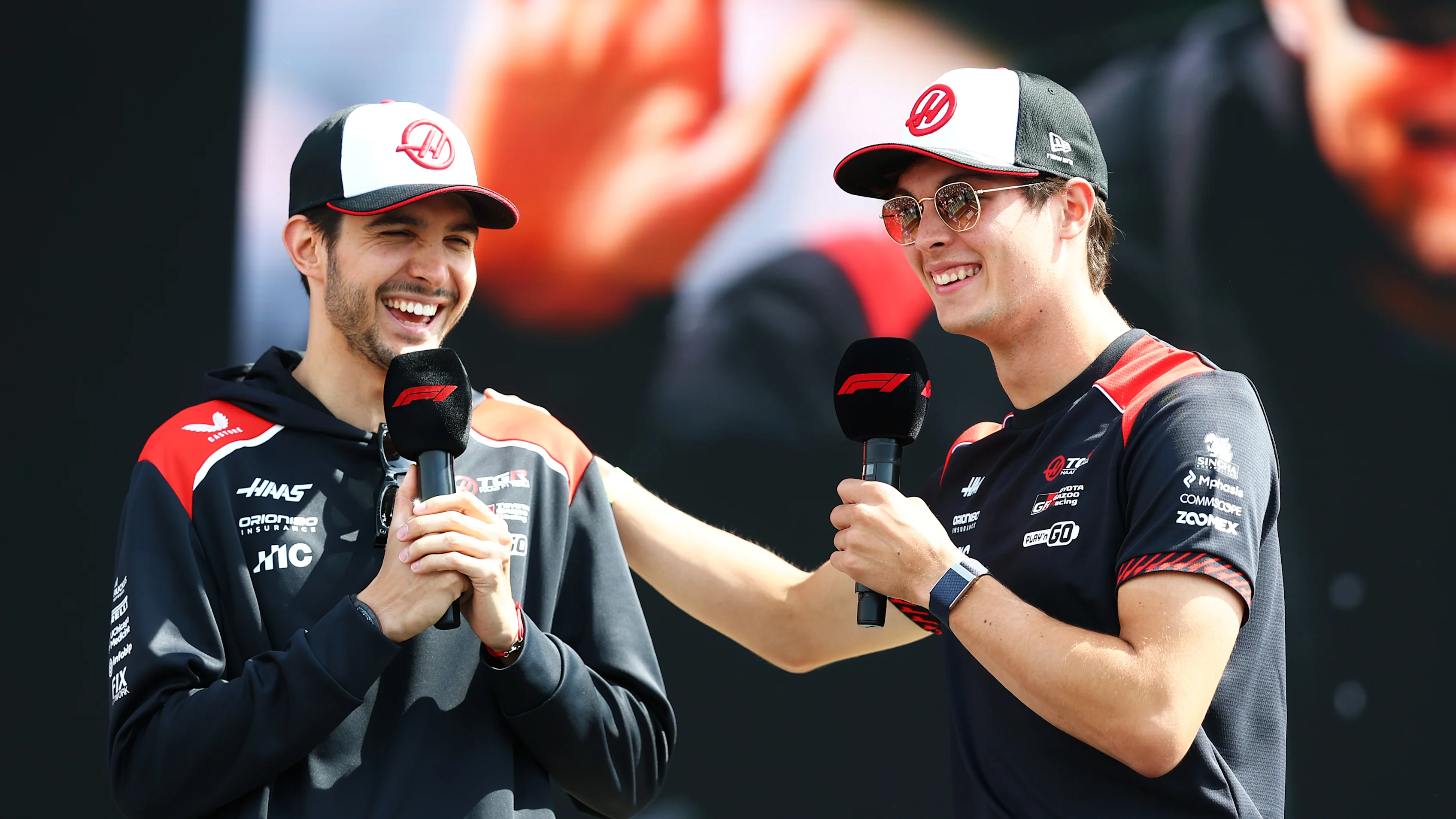 NORTHAMPTON, ENGLAND - JULY 03: Esteban Ocon of France and Haas F1 and Oliver Bearman of Great