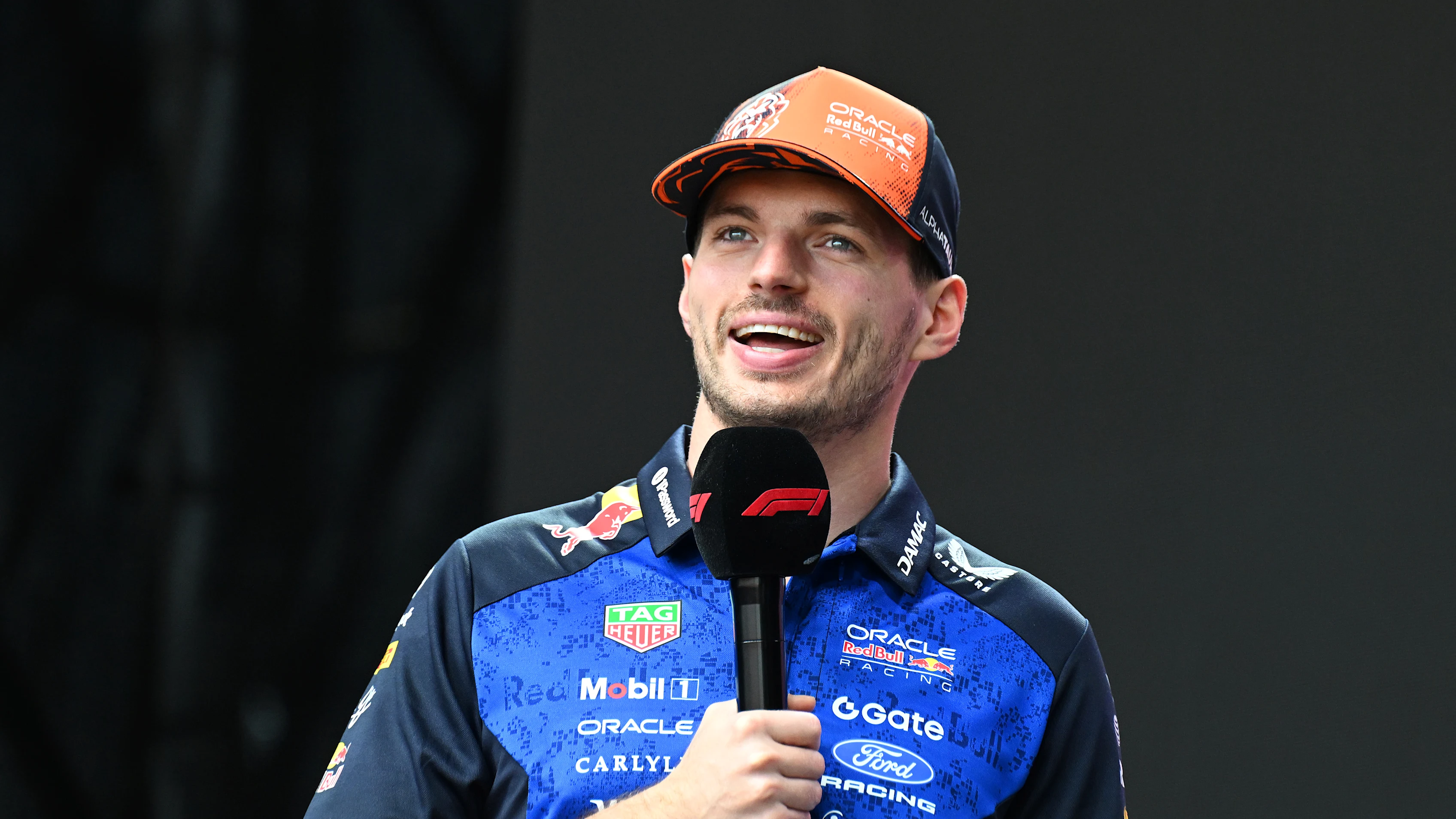 BUDAPEST, HUNGARY - JULY 25: Max Verstappen of the Netherlands and Oracle Red Bull Racing talks to