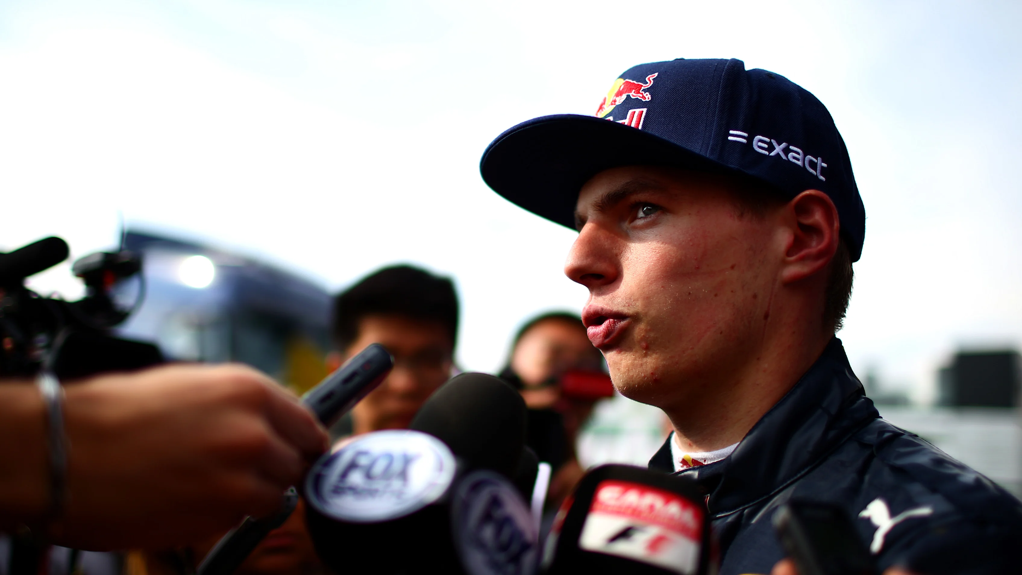 MONTMELO, SPAIN - MAY 18:  Max Verstappen of Netherlands and Red Bull Racing speaks with members of