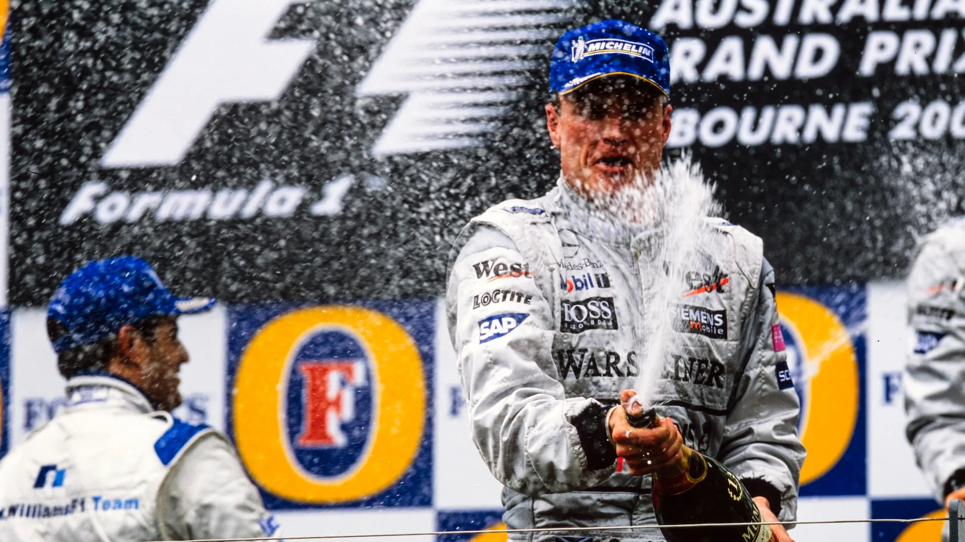 MELBOURNE GRAND PRIX CIRCUIT, AUSTRALIA - MARCH 09: David Coulthard, 1st position, celebrates his