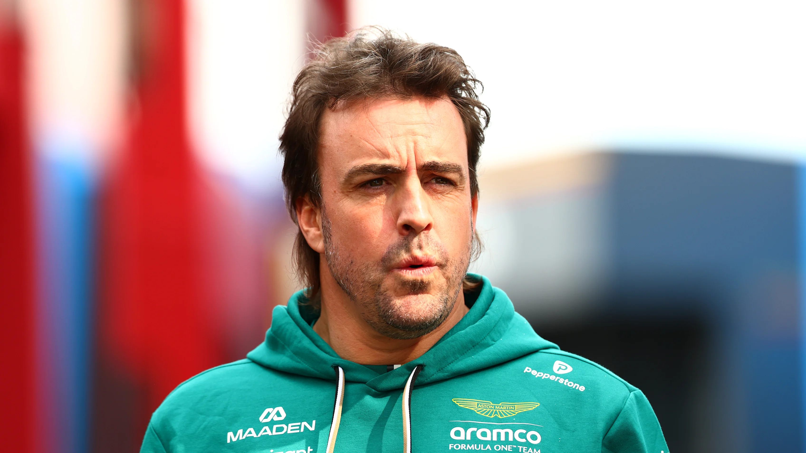 ZANDVOORT, NETHERLANDS - AUGUST 20: Fernando Alonso of Spain and Aston Martin F1 Team walks in the