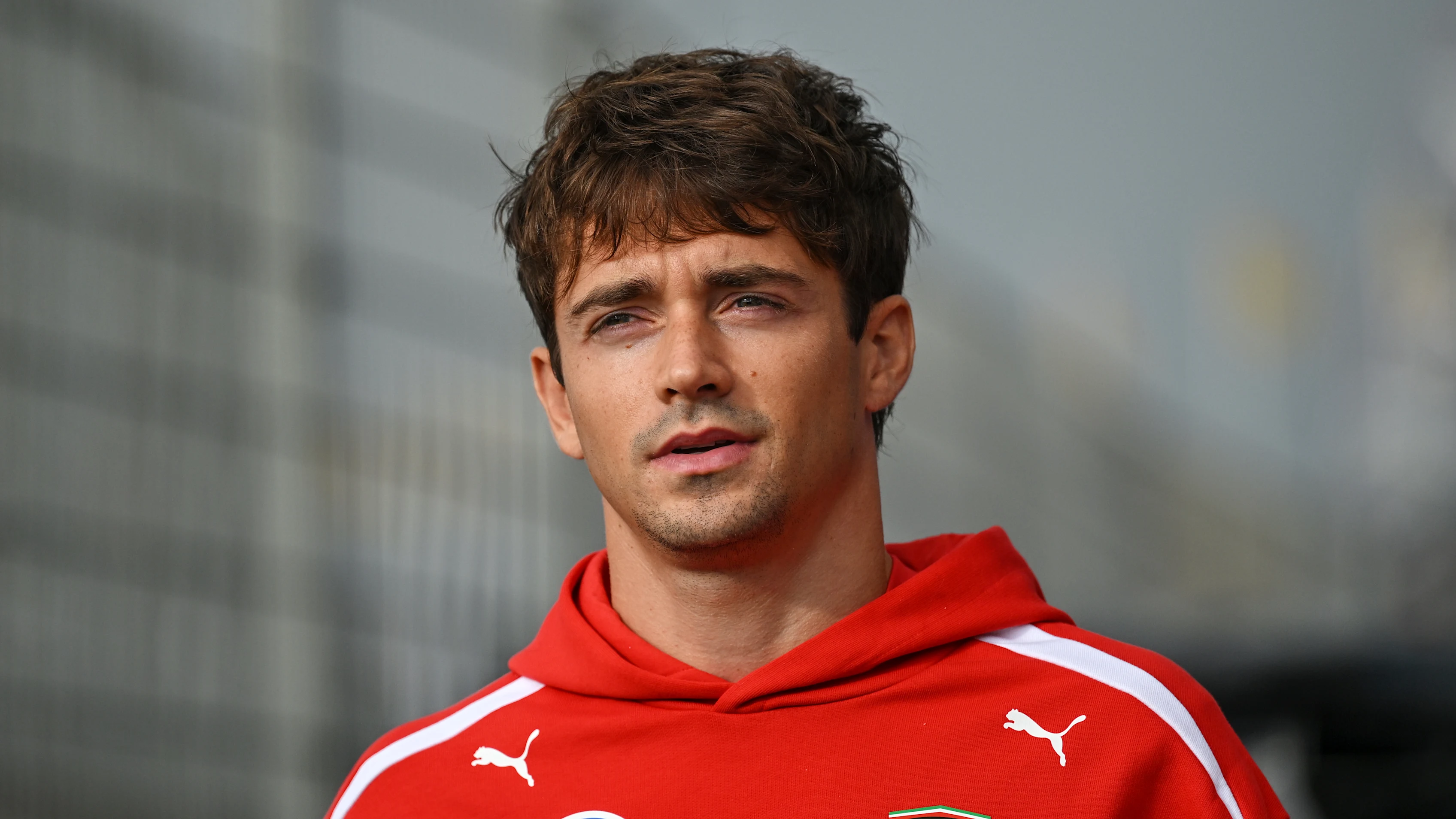 ZANDVOORT, NETHERLANDS - AUGUST 22: Charles Leclerc of Monaco and Scuderia Ferrari arrives in the