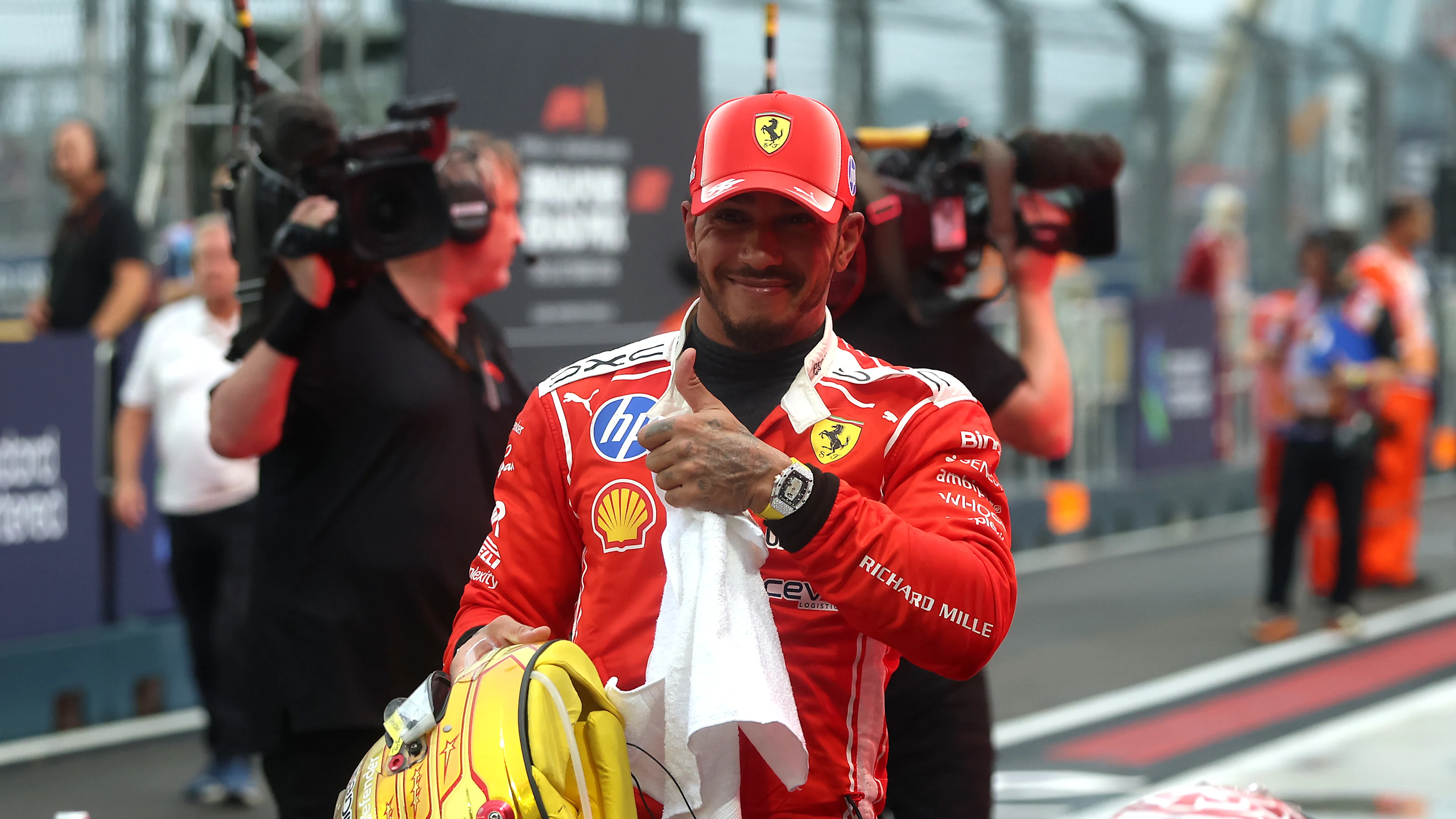SINGAPORE, SINGAPORE - OCTOBER 10: Second placed Lewis Hamilton of Great Britain and Scuderia