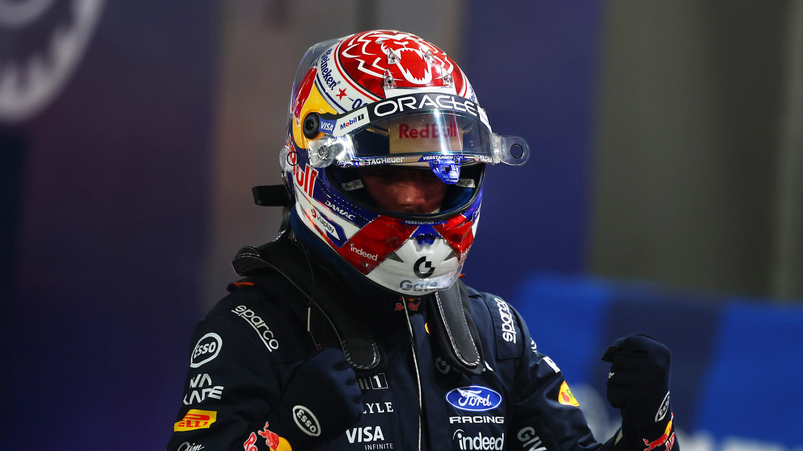 SINGAPORE, SINGAPORE - OCTOBER 10: Pole position qualifier Max Verstappen of the Netherlands and