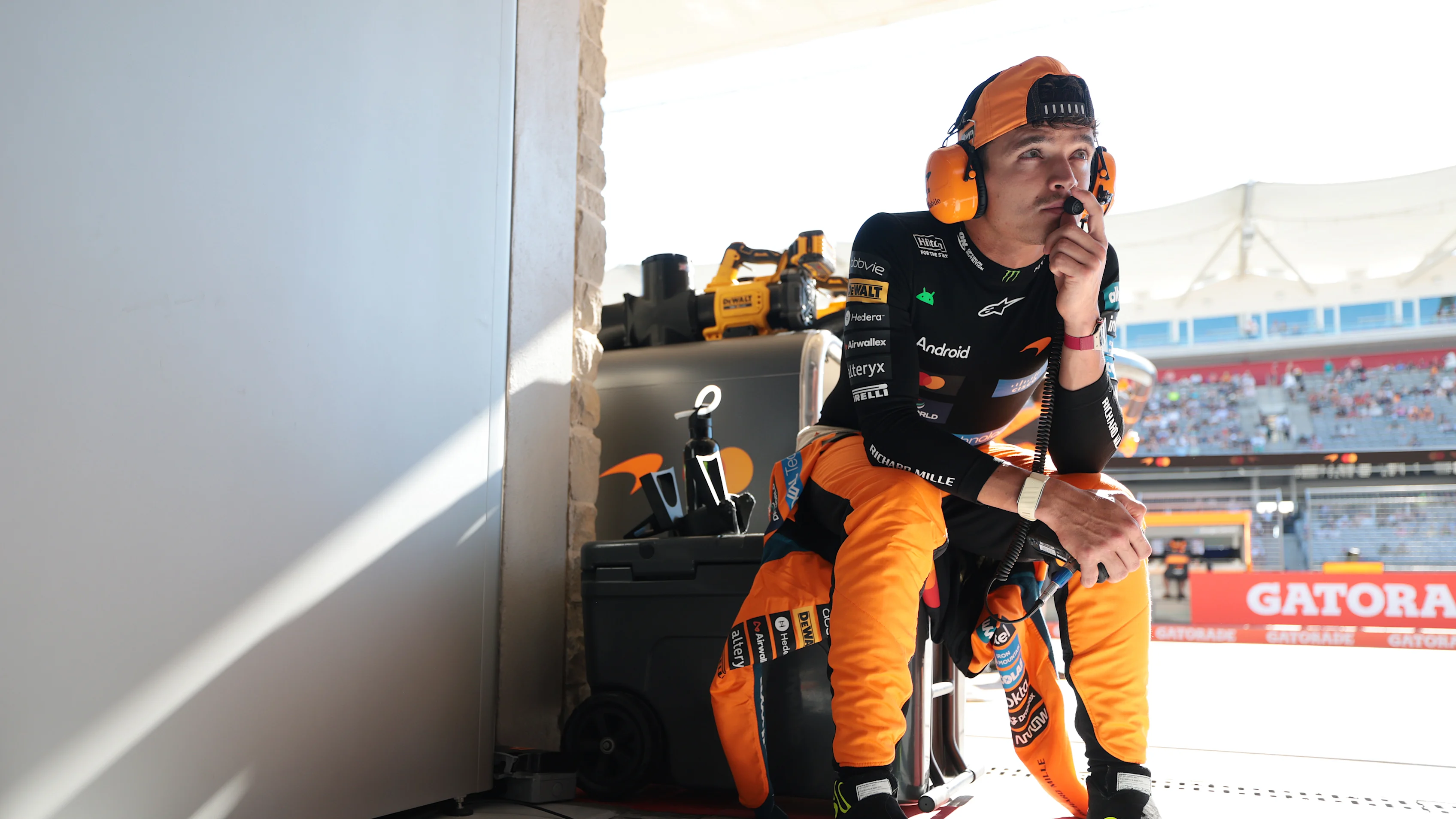 AUSTIN, TEXAS - OCTOBER 23: Lando Norris of Great Britain and McLaren looks on in the garage during