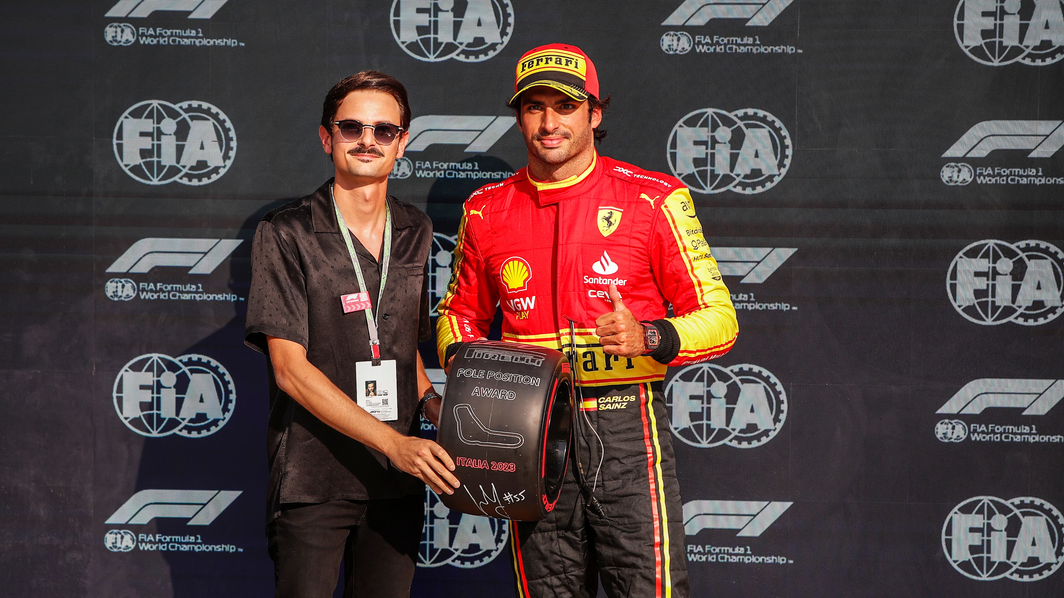 AUTODROMO NAZIONALE MONZA, ITALY - SEPTEMBER 02: Pole man Carlos Sainz, Scuderia Ferrari, receives