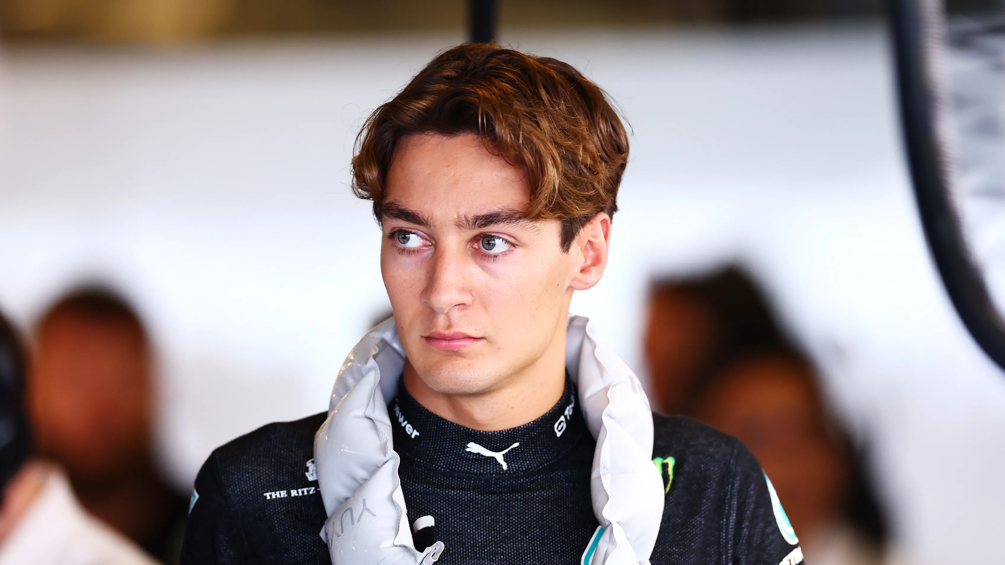 ABU DHABI, UNITED ARAB EMIRATES - NOVEMBER 25: George Russell of Great Britain and Mercedes looks