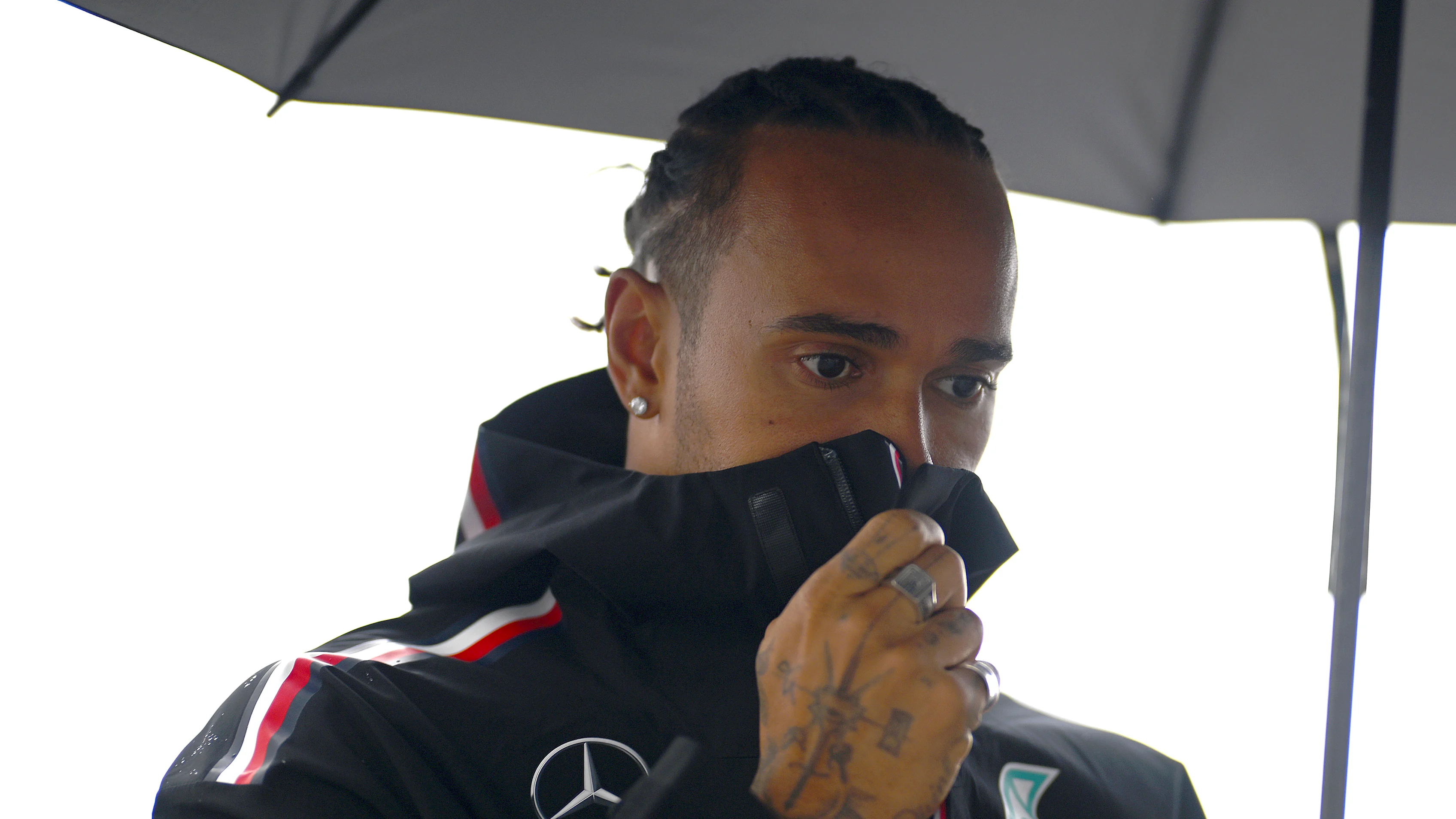 MONTREAL, QUEBEC - JUNE 15:  Lewis Hamilton of Great Britain and Mercedes walks in the Paddock