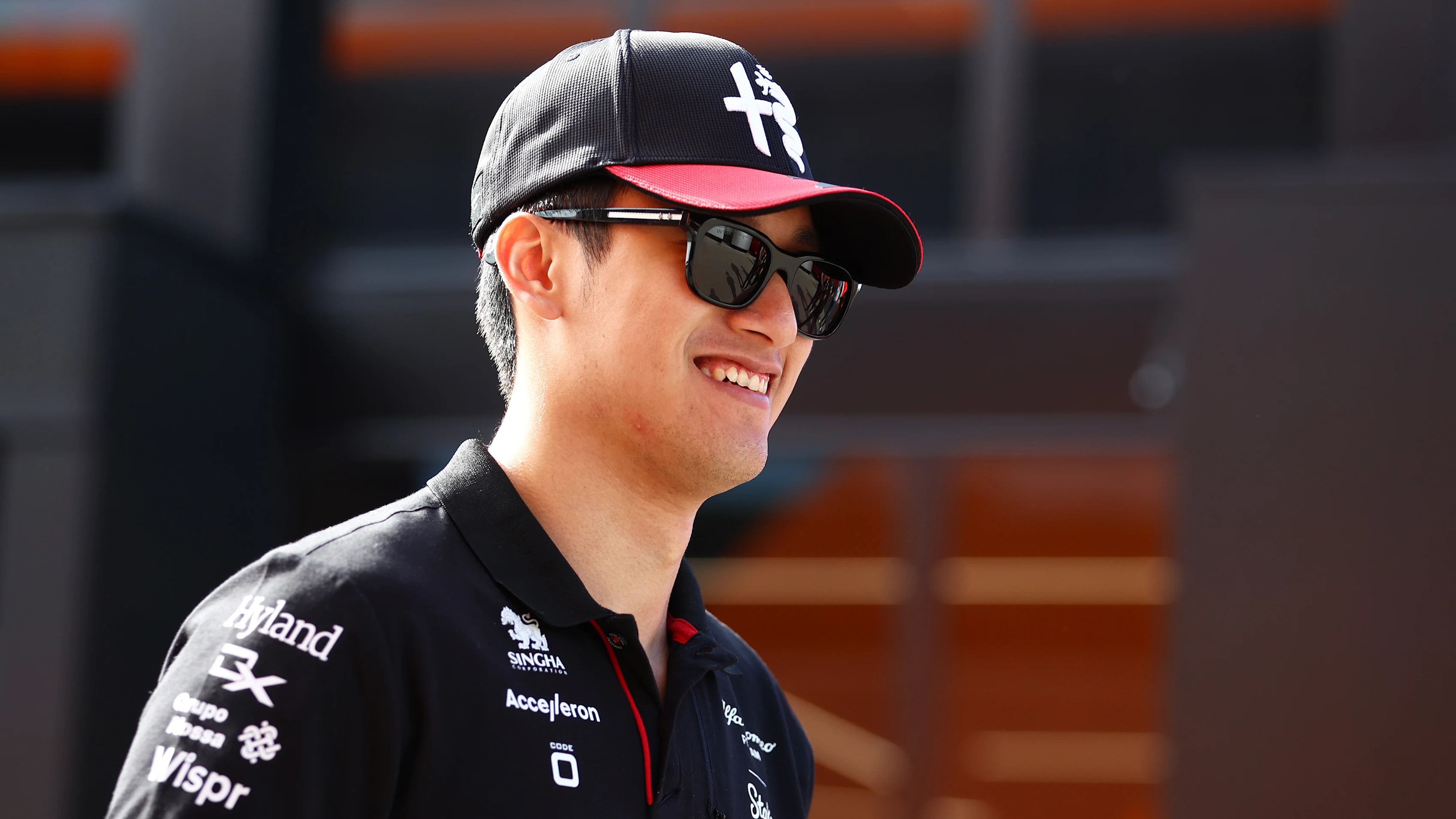 MONZA, ITALY - SEPTEMBER 01: Zhou Guanyu of China and Alfa Romeo F1 walks in the Paddock prior to