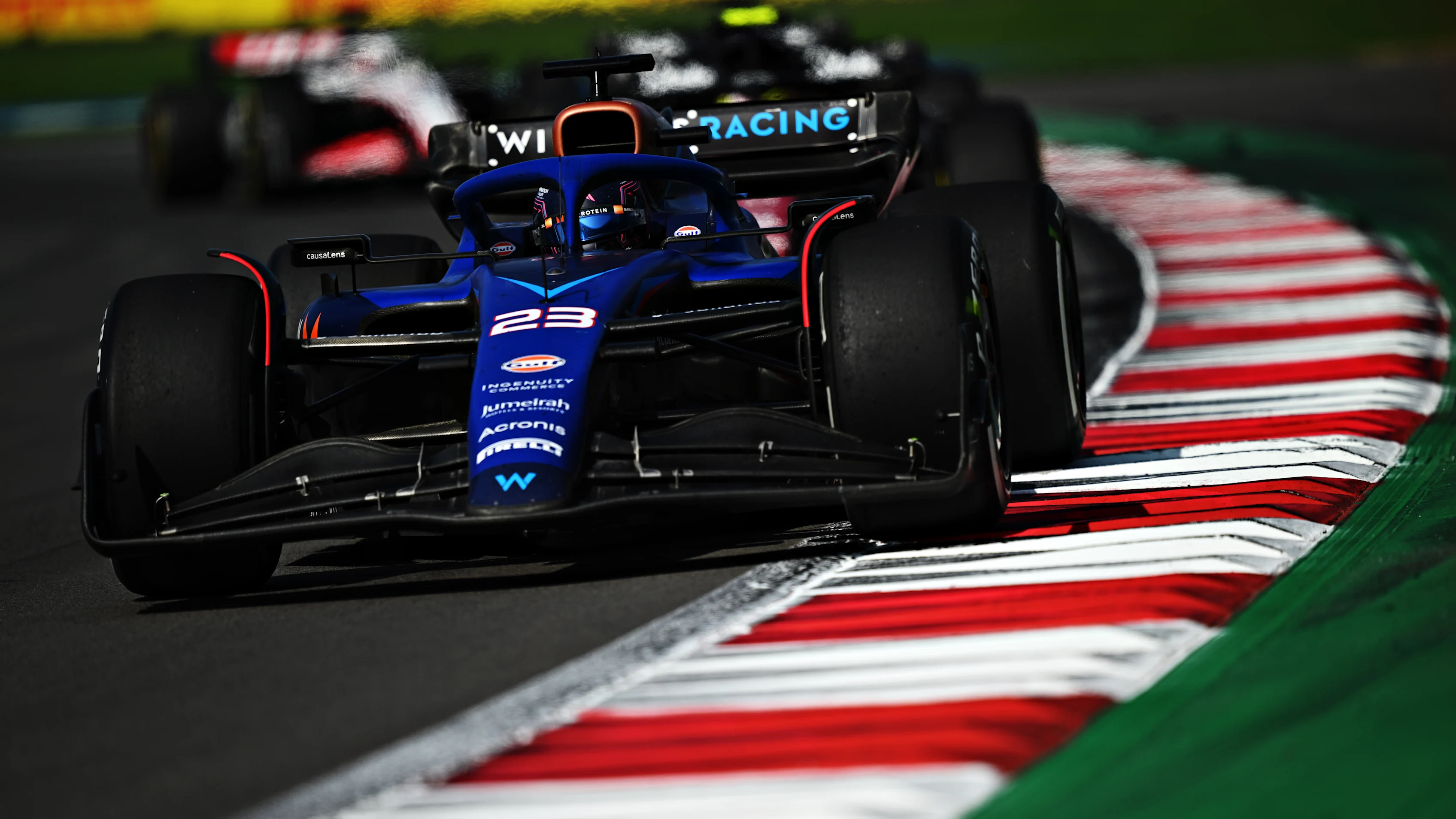 MEXICO CITY, MEXICO - OCTOBER 27: Alexander Albon of Thailand and Williams looks on in the garage