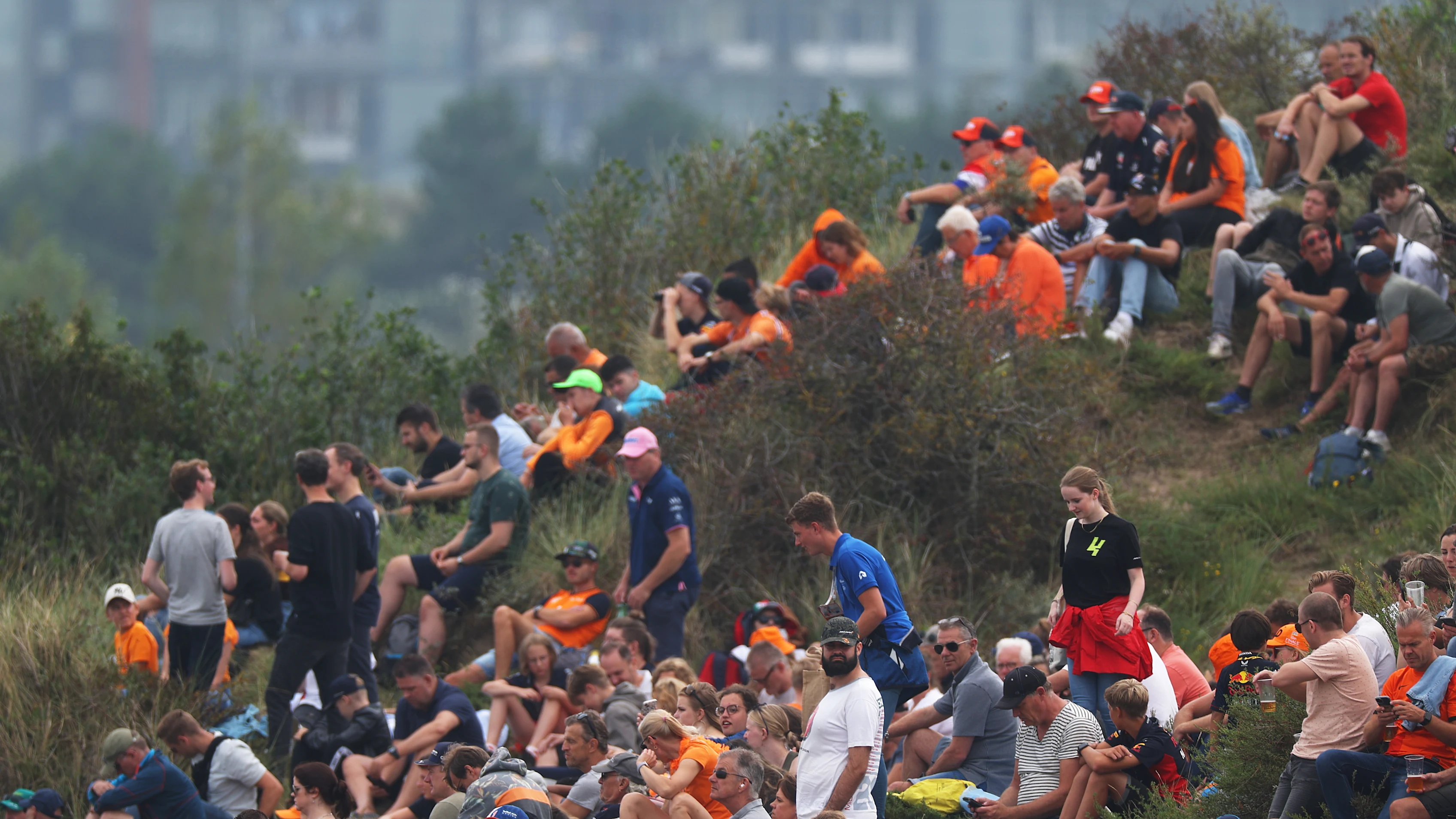 ZANDVOORT, NETHERLANDS - AUGUST 25: Fans watch the action prior to practice ahead of the F1 Grand