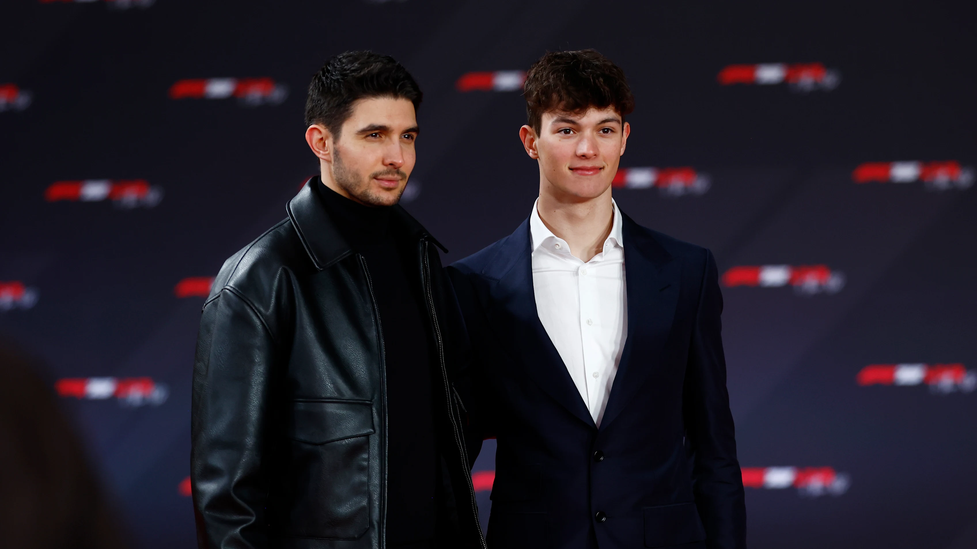 LONDON, ENGLAND - FEBRUARY 18: Oliver Bearman of Great Britain and Haas F1 and Esteban Ocon of
