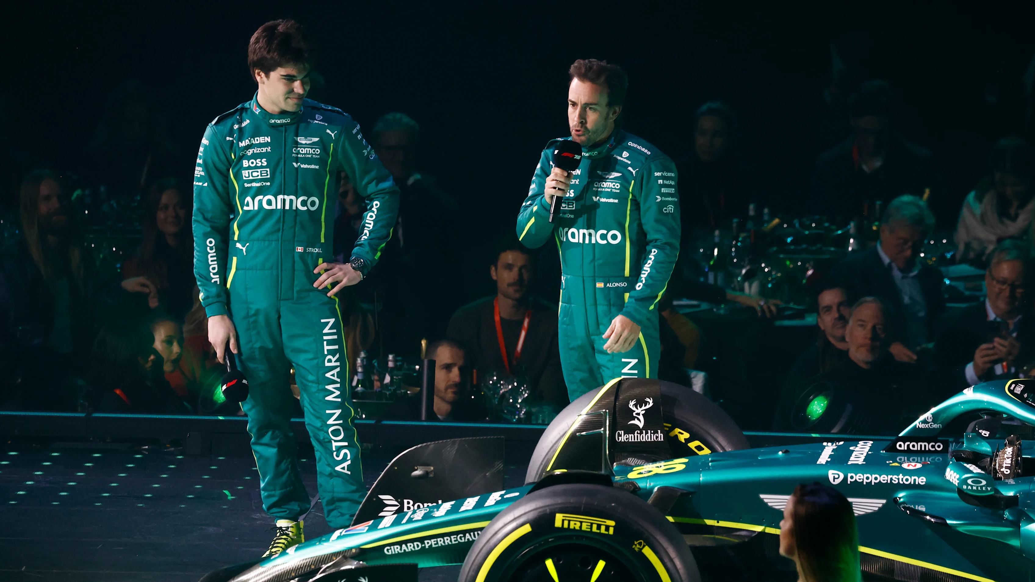 LONDON, ENGLAND - FEBRUARY 18: Fernando Alonso of Spain and Aston Martin F1 Team speaks to the