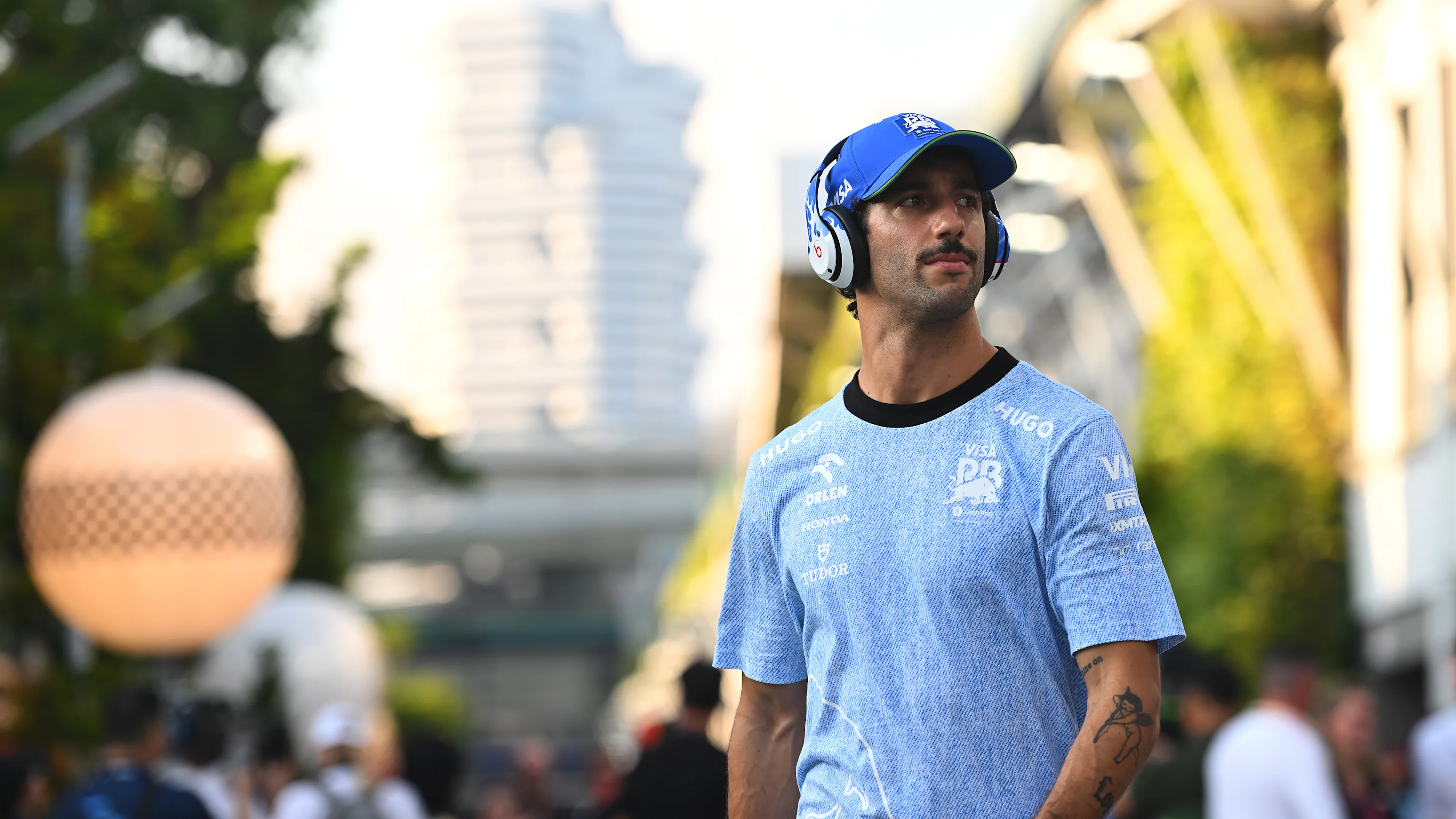 SINGAPORE, SINGAPORE - SEPTEMBER 22: Daniel Ricciardo of Australia and Visa Cash App RB looks on in