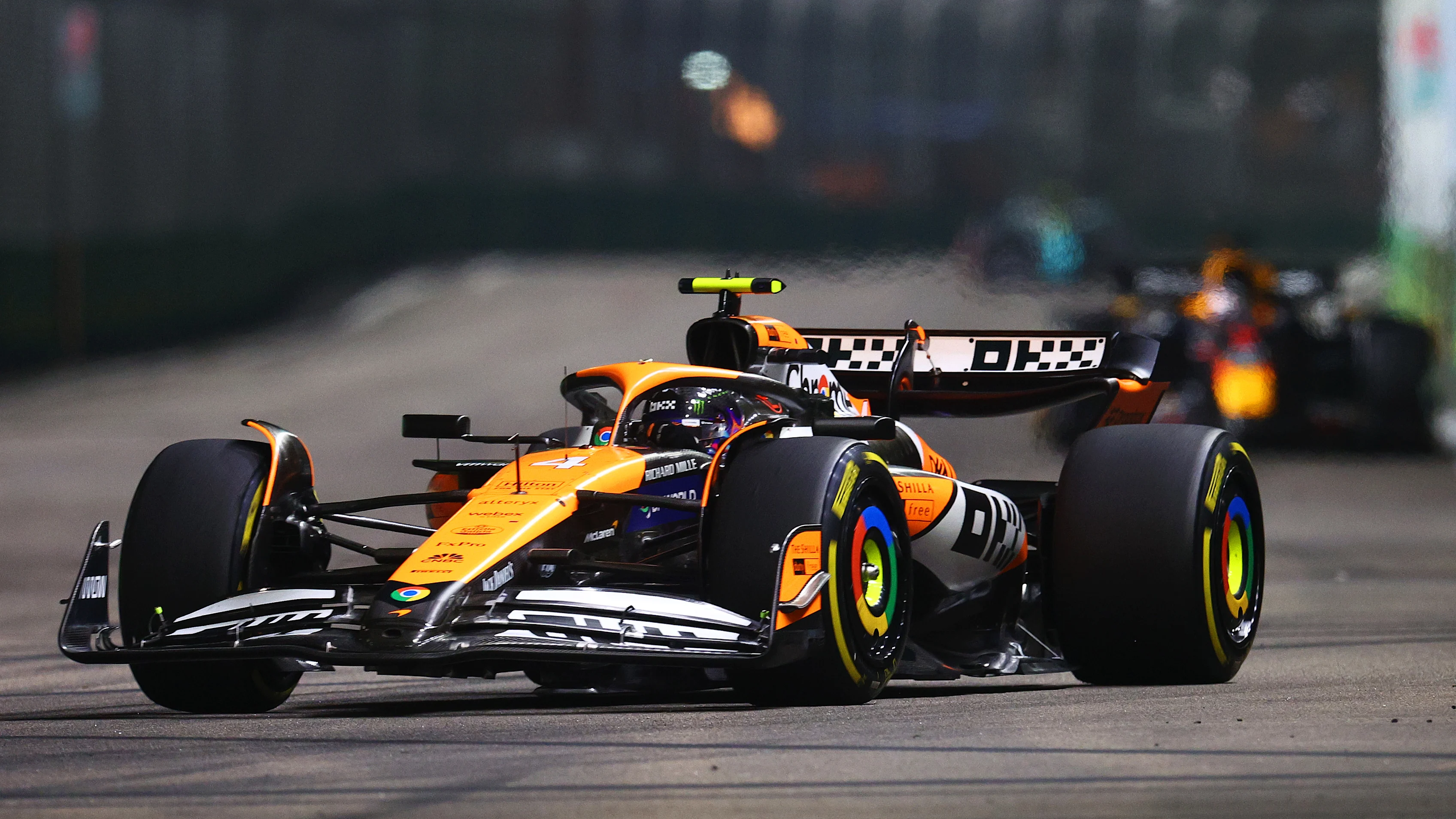 SINGAPORE, SINGAPORE - SEPTEMBER 22: Lando Norris of Great Britain driving the (4) McLaren MCL38