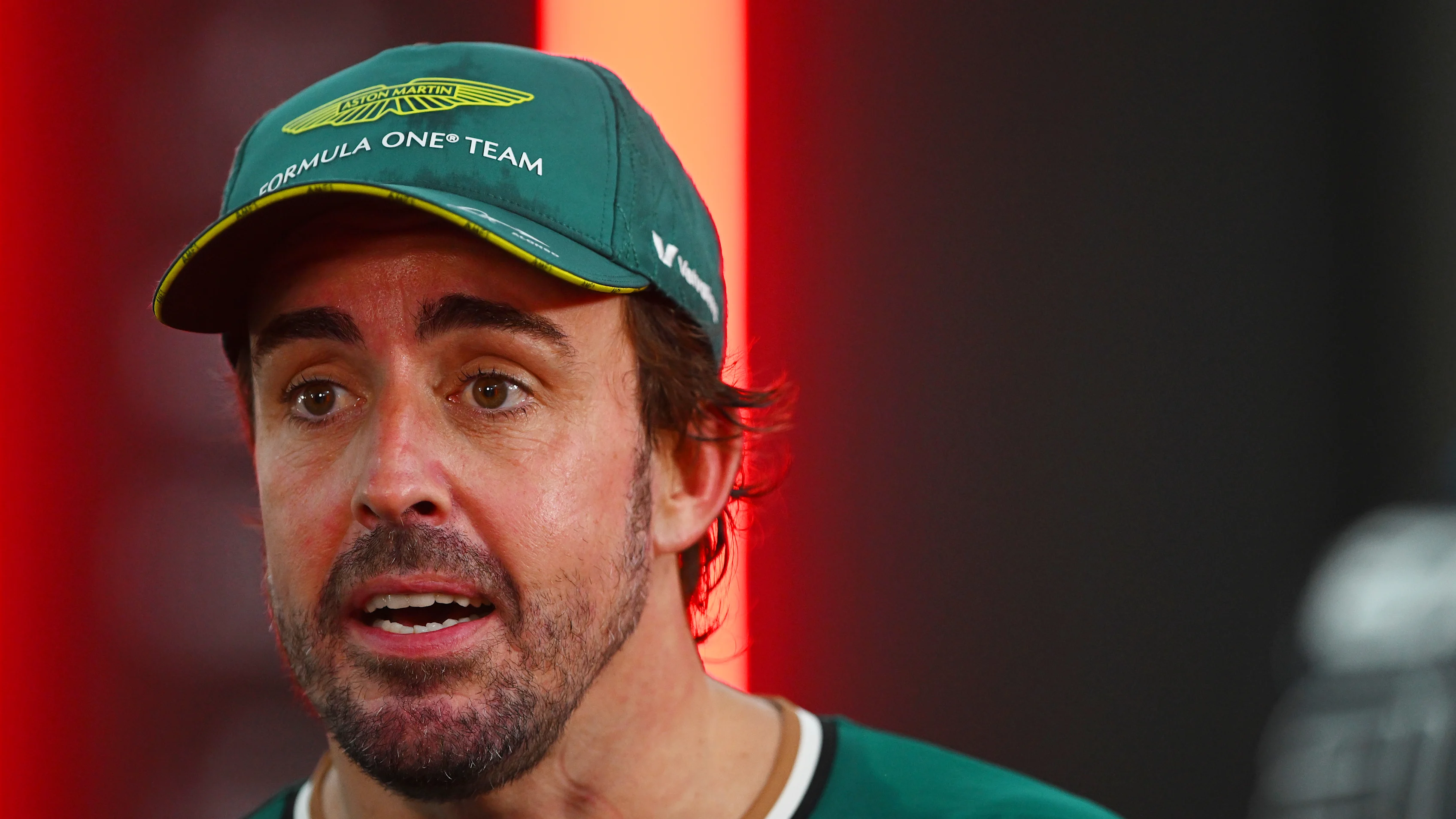 SINGAPORE, SINGAPORE - SEPTEMBER 22: 8th placed Fernando Alonso of Spain and Aston Martin F1 Team