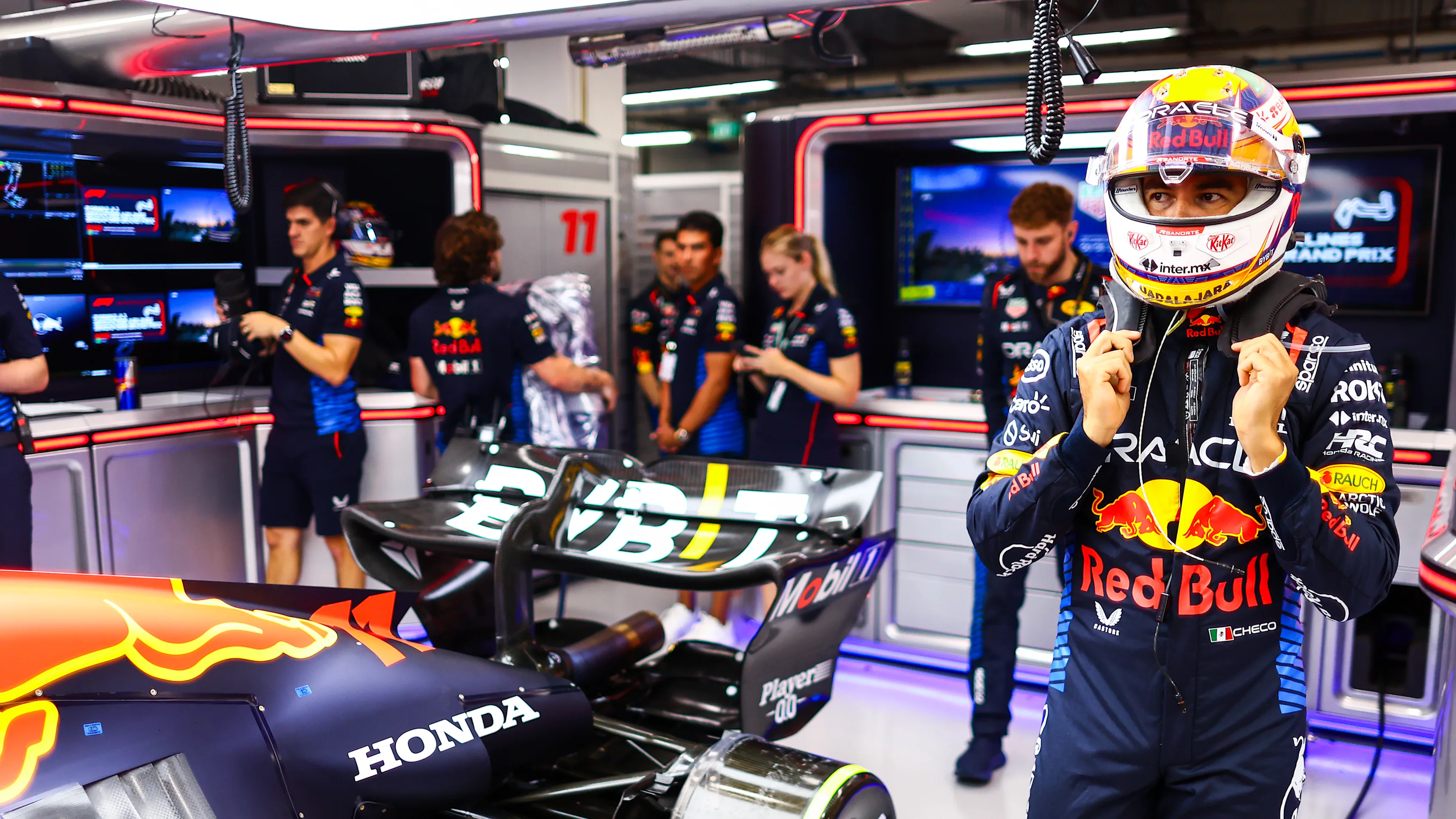 SINGAPORE, SINGAPORE - SEPTEMBER 22: Sergio Perez of Mexico and Oracle Red Bull Racing prepares in