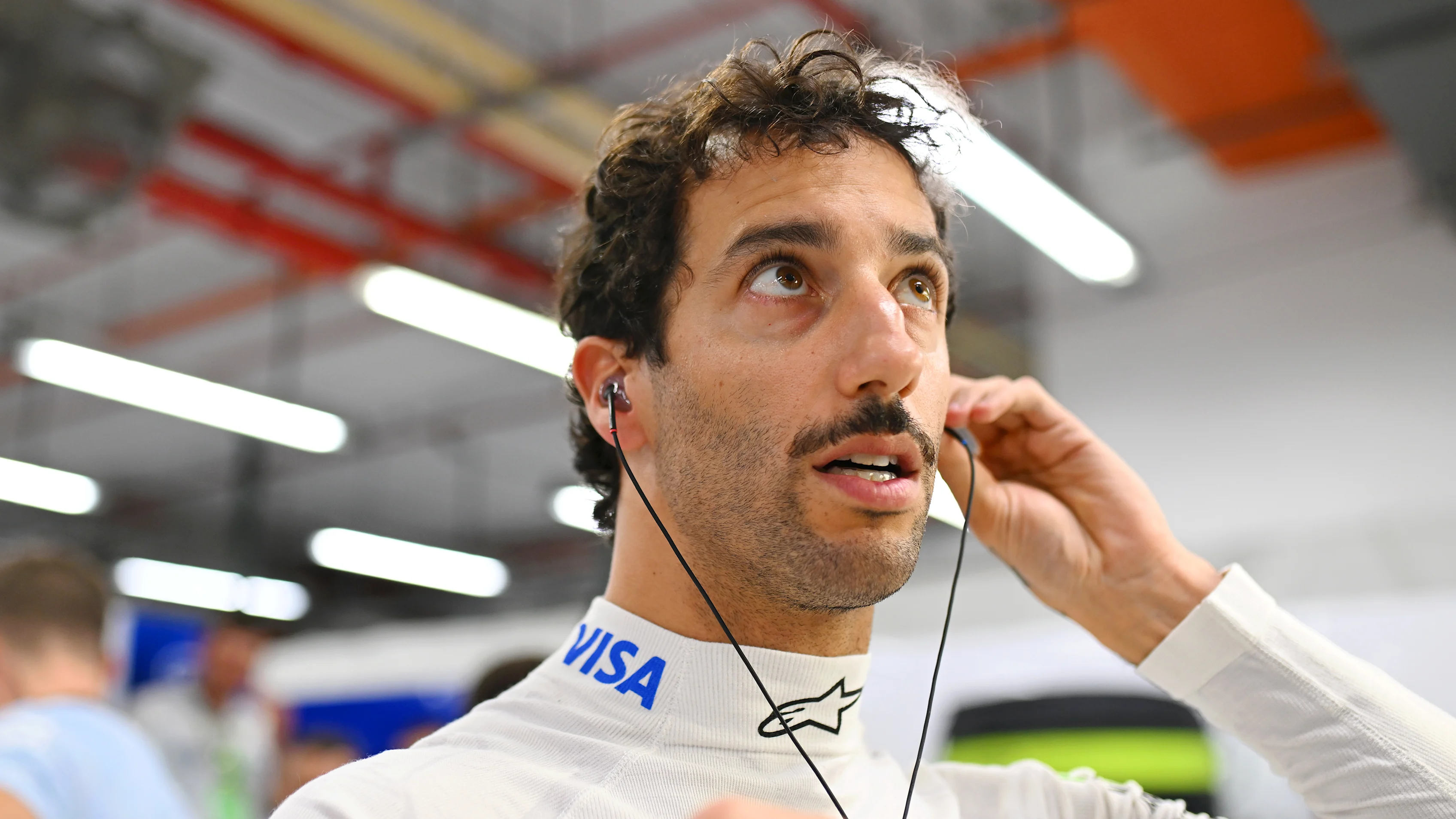 SINGAPORE, SINGAPORE - SEPTEMBER 22: Daniel Ricciardo of Australia and Visa Cash App RB prepares in