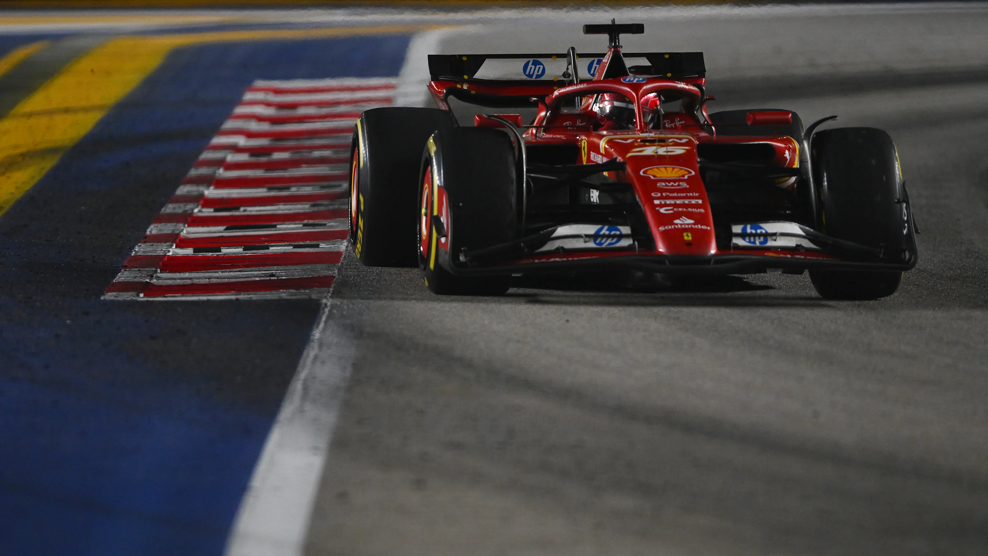 SINGAPORE, SINGAPORE - SEPTEMBER 22: Charles Leclerc of Monaco driving the (16) Ferrari SF-24 on