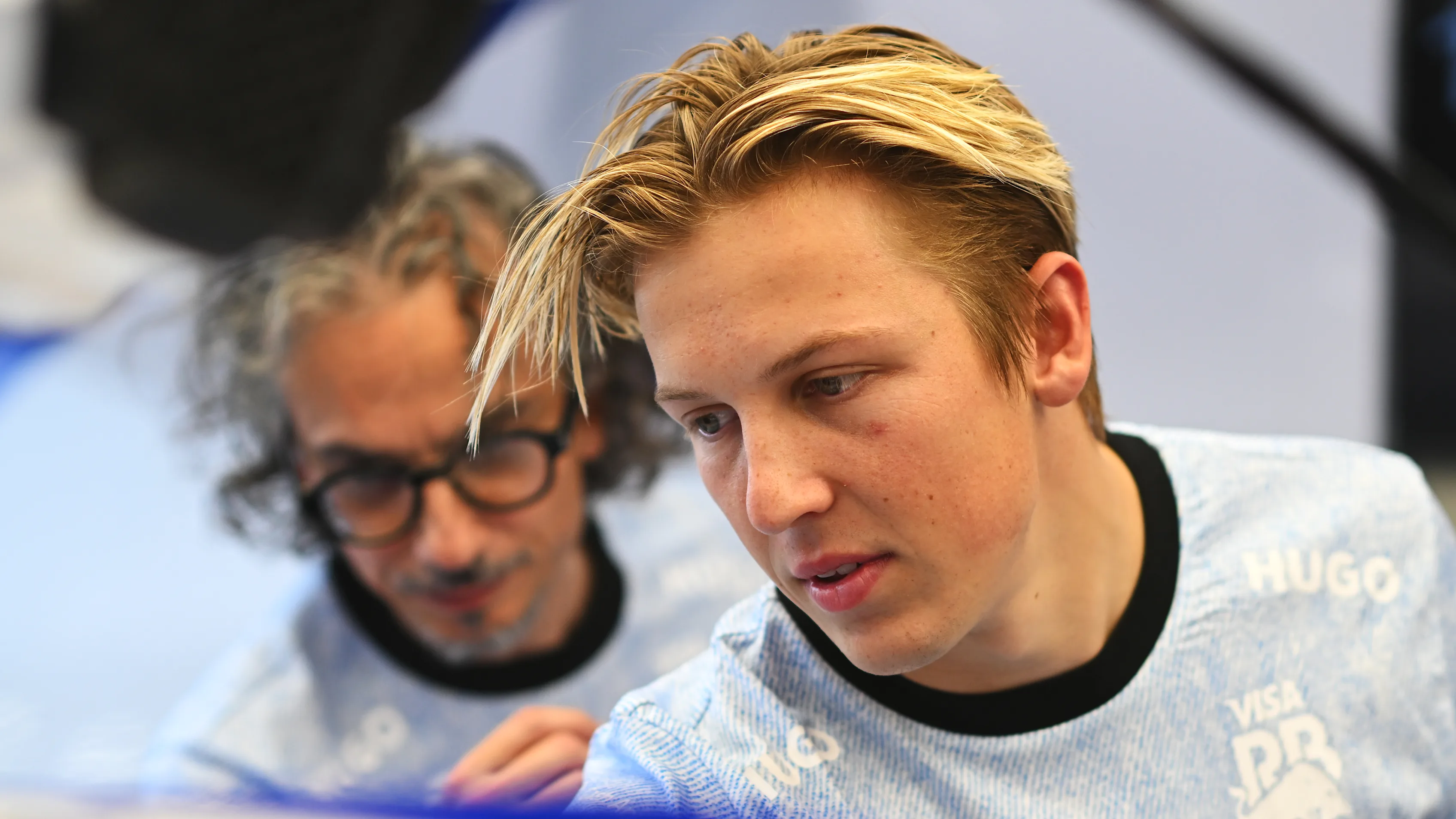 SINGAPORE, SINGAPORE - SEPTEMBER 20: Liam Lawson of New Zealand and Visa Cash App RB looks on in