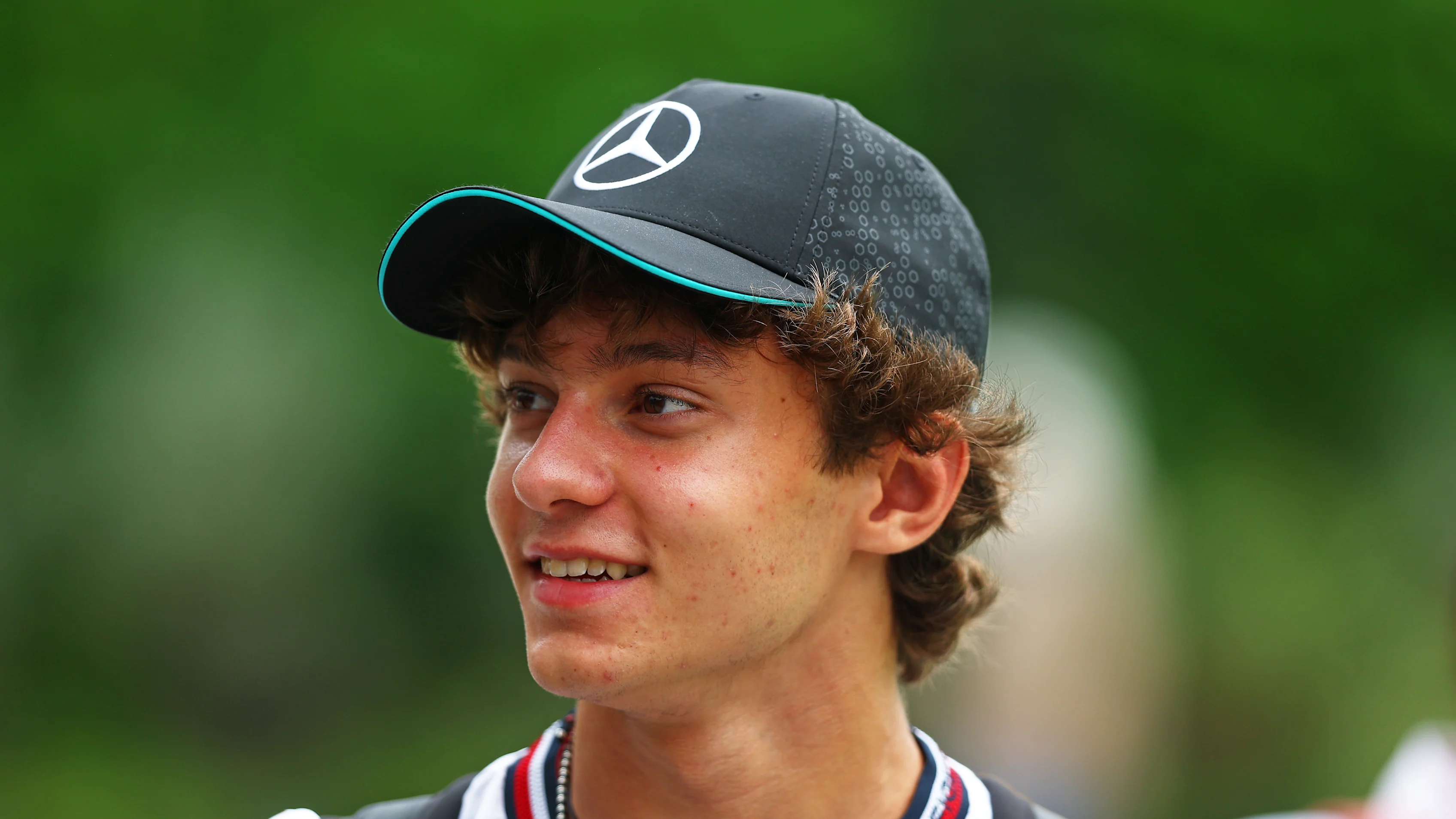SINGAPORE, SINGAPORE - SEPTEMBER 19: Andrea Kimi Antonelli of Italy and Mercedes walks in the