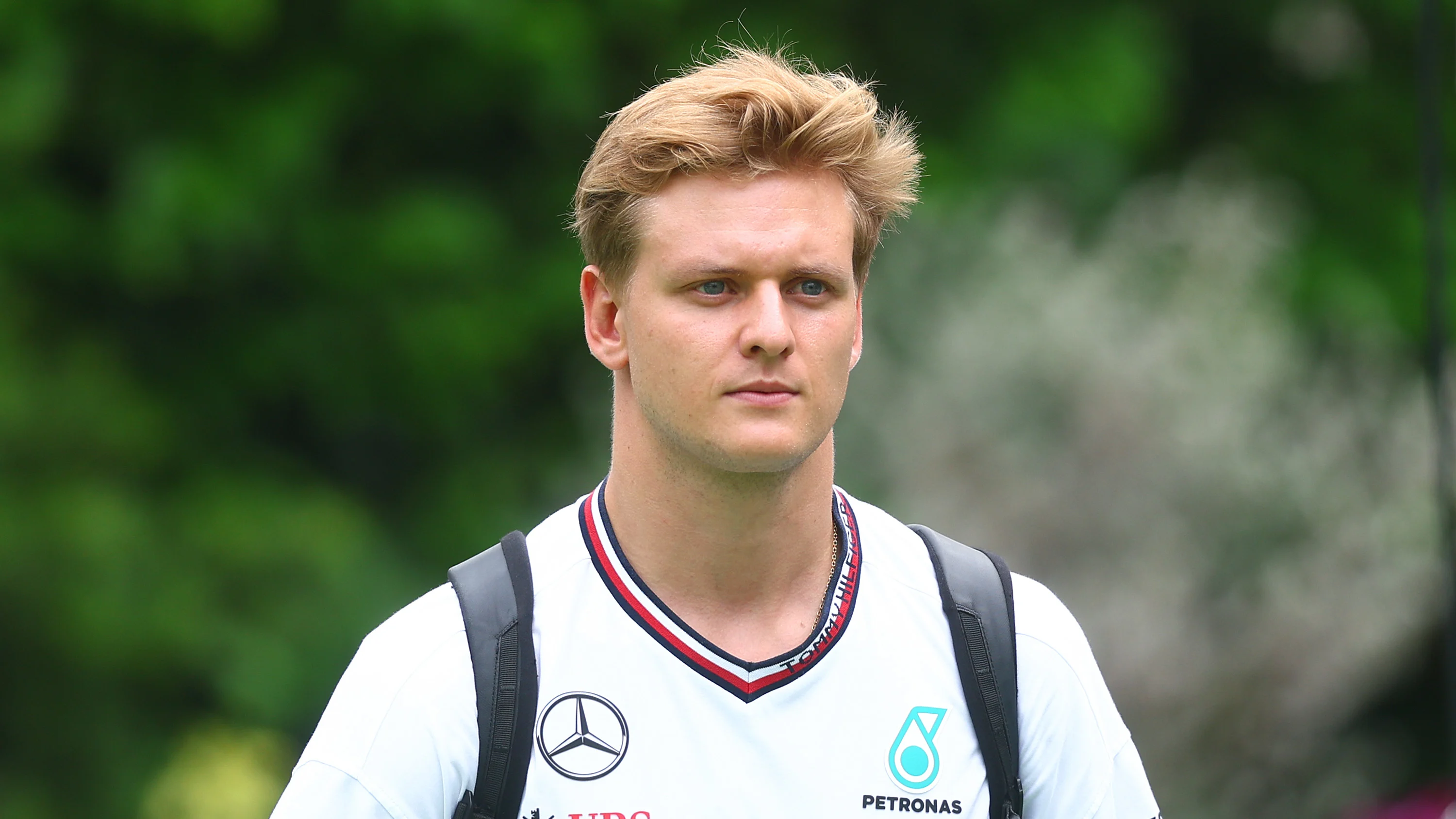 SINGAPORE, SINGAPORE - SEPTEMBER 19: Mick Schumacher of Germany, Reserve Driver of Mercedes walks